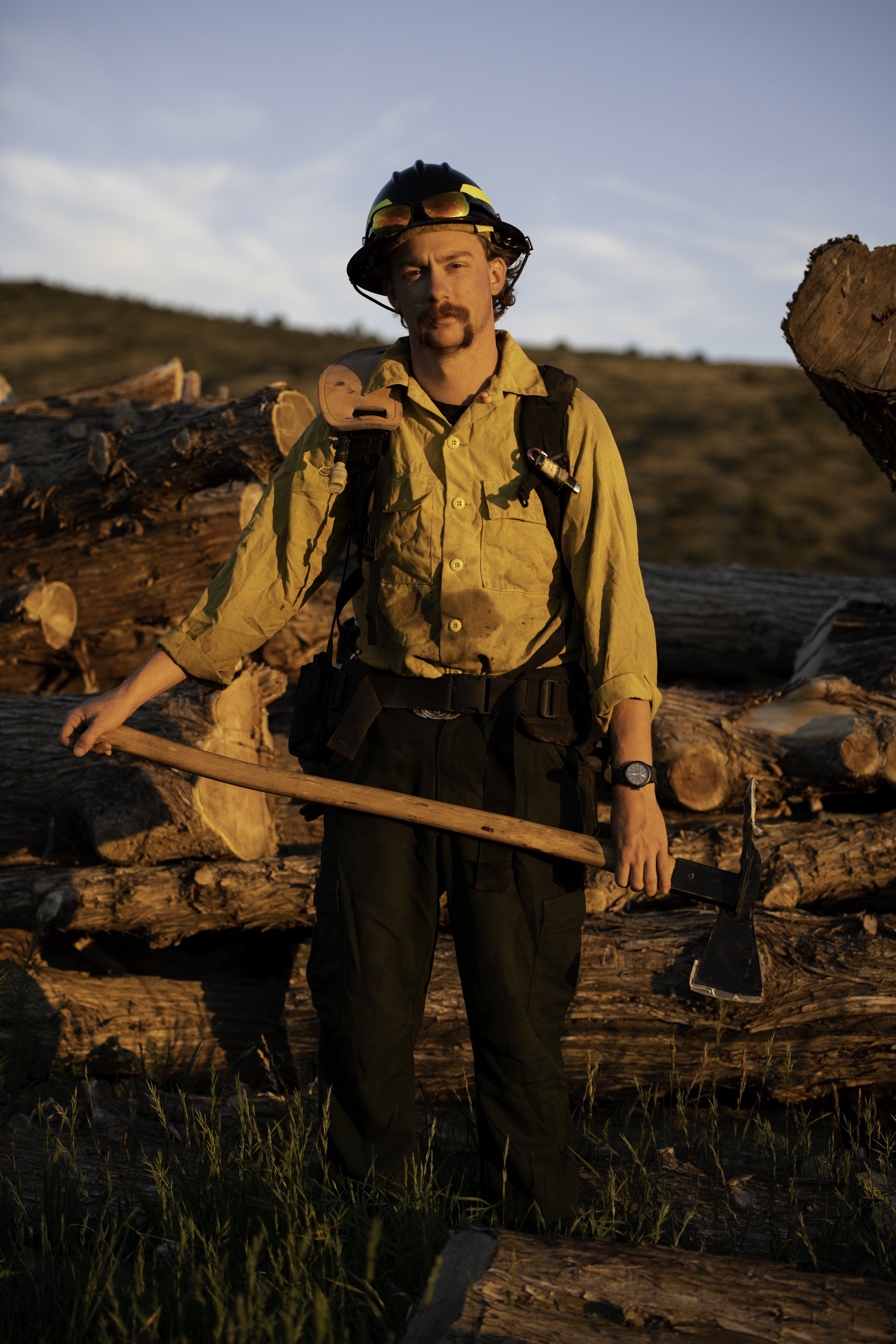  Field Manager, Ben Harper poses for a portrait behind the conservation office at Philmont Scout Ranch on July 13, 2022, in Cimarron, N.M. Harper has worked on the ranch for 12 seasons in counting and now volunteers as a wildland firefighter.  