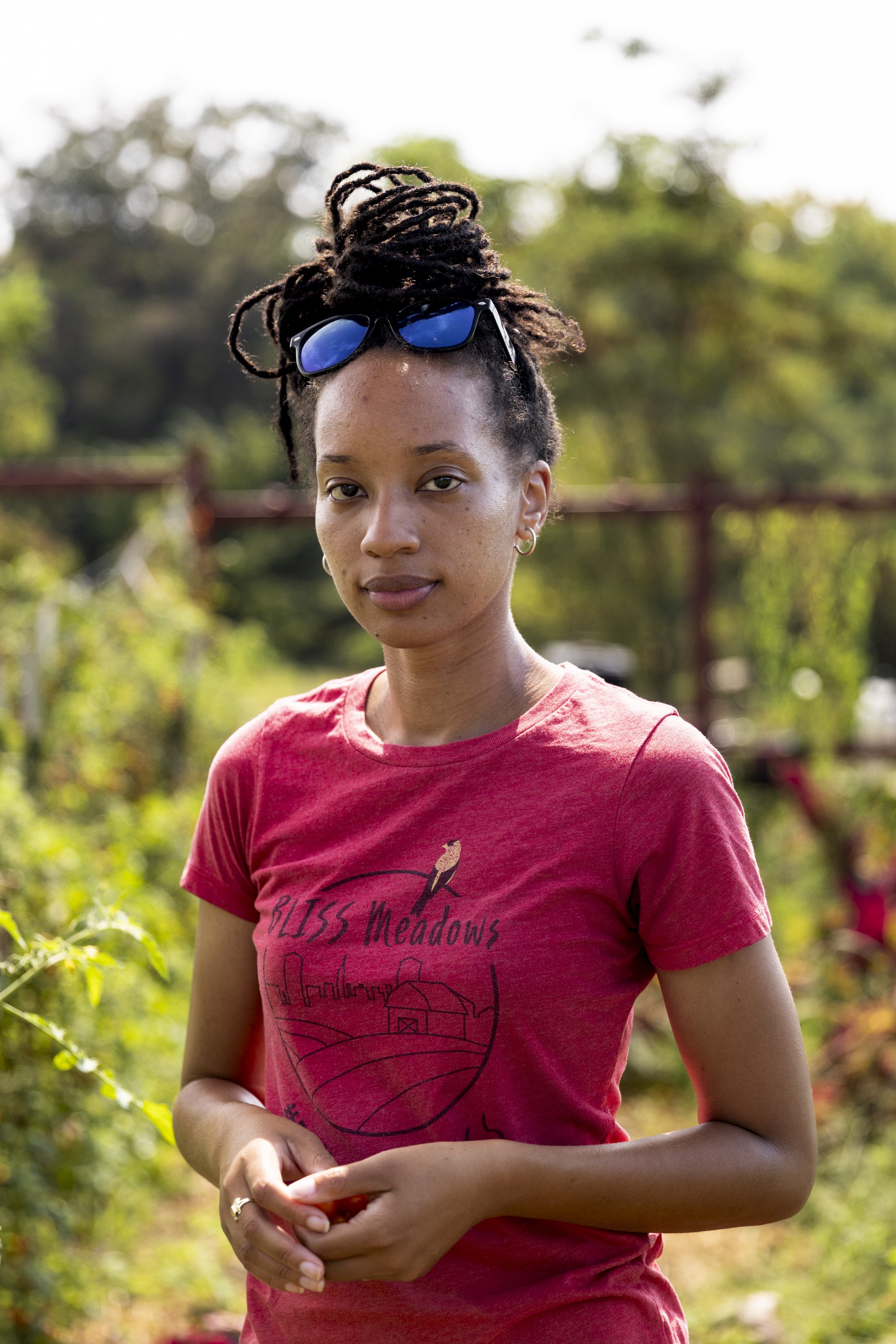  Atiya Wells poses for a portrait in the BLISS Meadows grow space in Baltimore, Md., on Sept. 9, 2023. Since beginning Backyard Basecamp, Wells has found a connection to nature in Baltimore City and works hard to share that connection with her commun