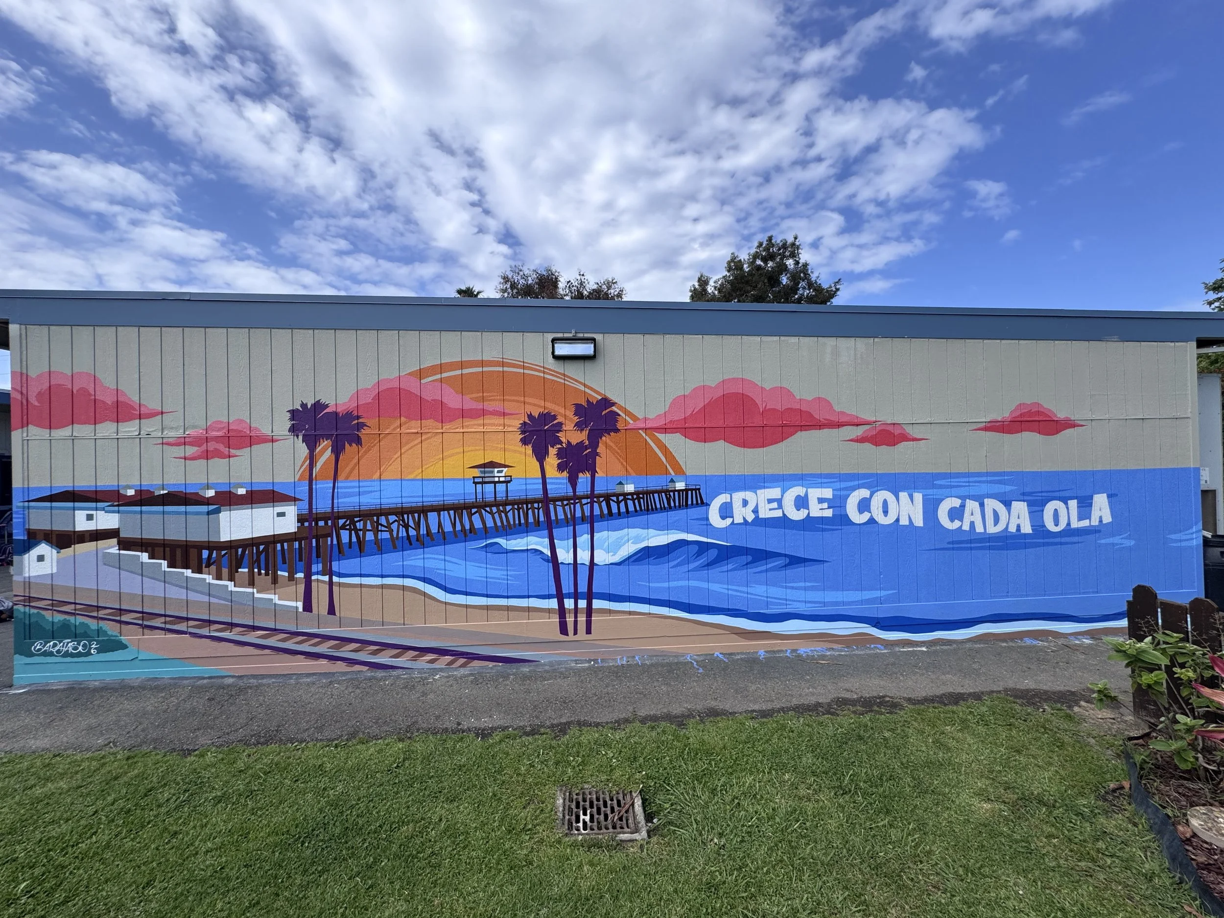San Clemente Pier “Crece Con Cada Ola", exterior acrylic paint and Montana Gold spray paint, 50’ x 11 ‘. 
