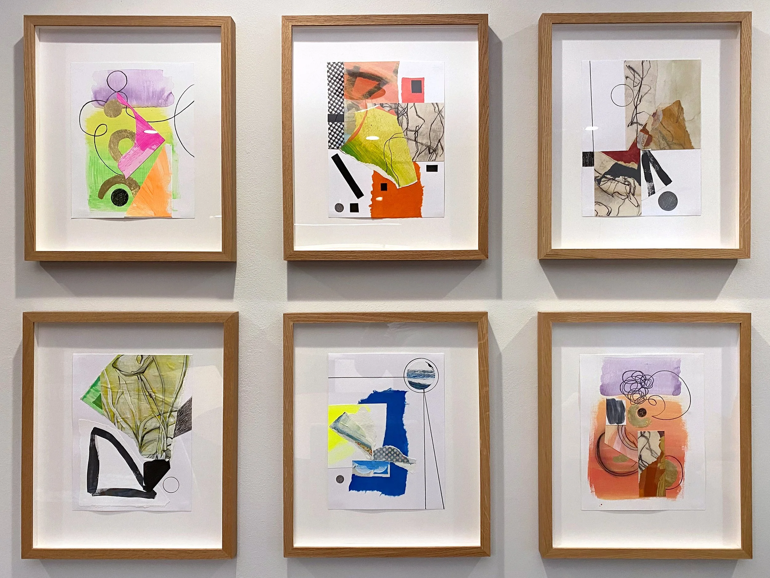 Contemporary collage artworks framed in oak