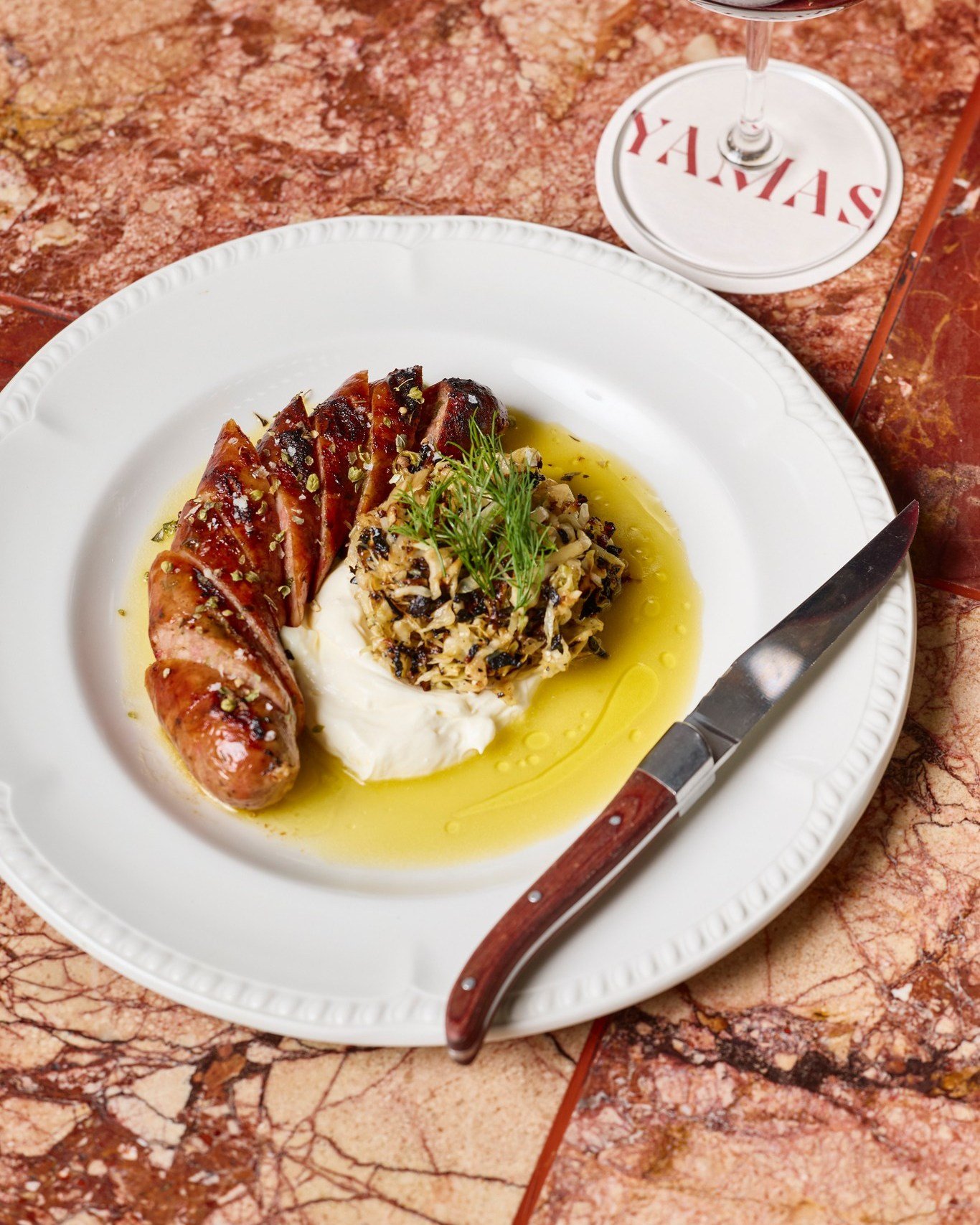 Taste the bold flavours of our Loukaniko: spicy village sausage served with charred cabbage and creamy tyrokafteri sauce 🌶

Yamas will be open for all-day dining for today's public holiday from 11am - 10pm.

www.yamasrestaurant.com.au/bookings to re