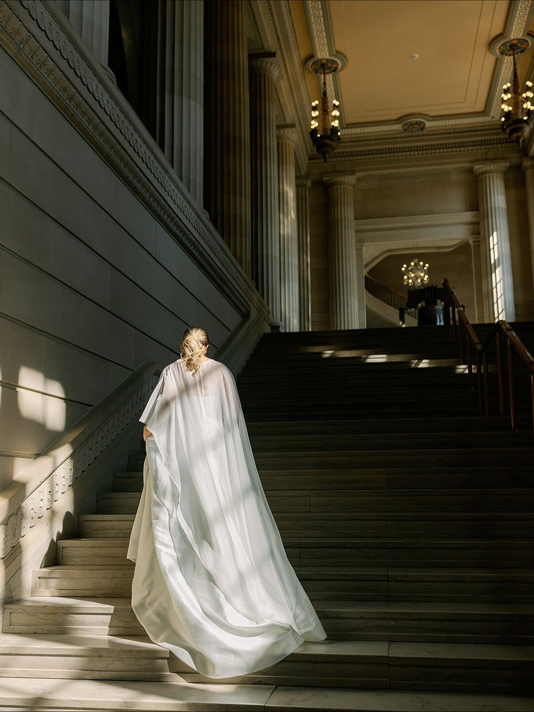 Our bride Grace, draped in a fashion-forward cape that flowed effortlessly with every step, her look was the perfect blend of classic romance and couture confidence.

Coordination | @katieoevents&nbsp;
Venue | @fortorangeclub 
Caterer | @fortorangecl