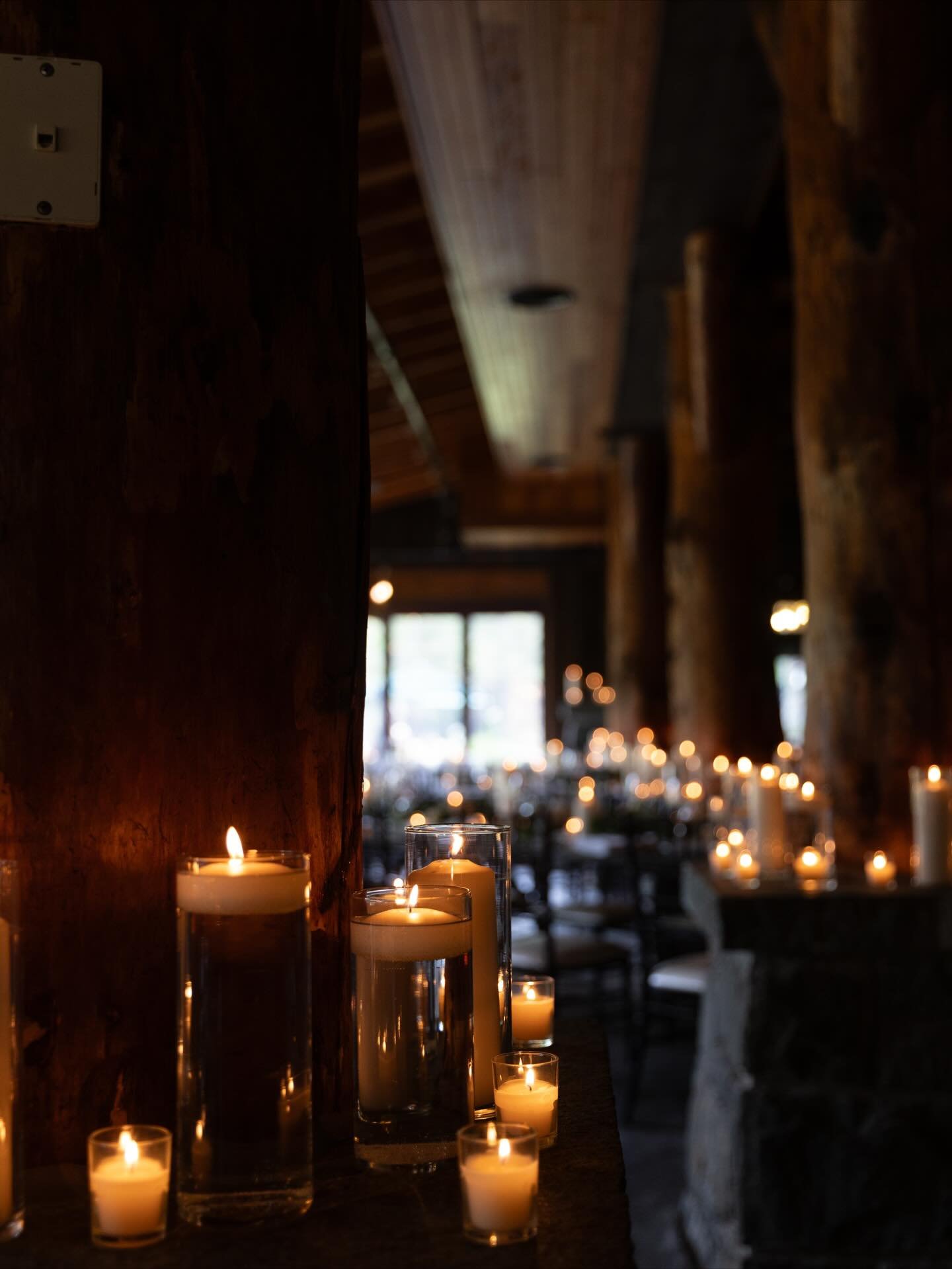 At Whiteface Lodge the room smells like mountain air and romance, the tables flicker with hundreds of tiny flames, and every corner feels like the coziest nook in the Adirondacks. Give us the timber beams, the crackling-fireplace vibes, &amp; so much