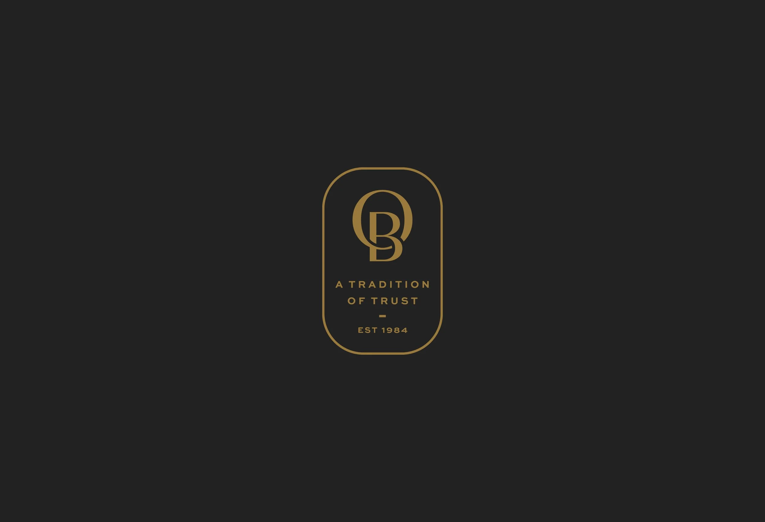 Logo with stylized 'D' and 'B' letters, gold text reading 'A TRADITION OF TRUST EST 1984' on a black background.