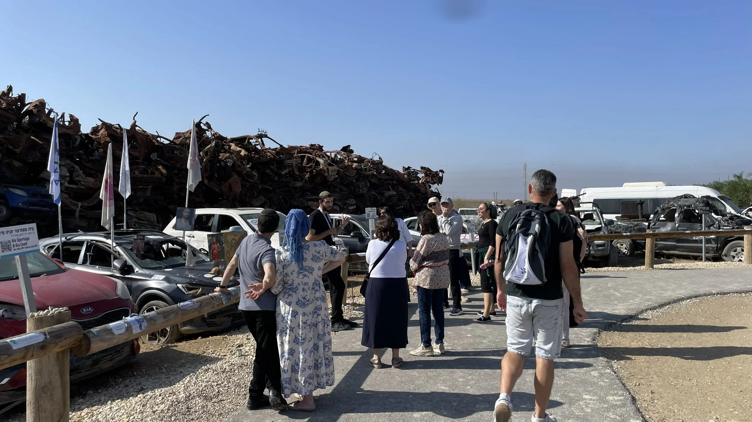  A temporary memorial site. The burnt cars lot near Tkuma 