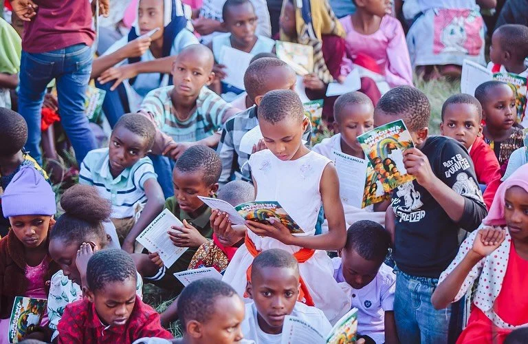 One of our favorite moments is handing out Mini Books to every child at the festival! 📖

Each book tells the story of Jesus in a simple, beautiful way that kids can understand and share. ✨

We pray these little books keep spreading the Good News far
