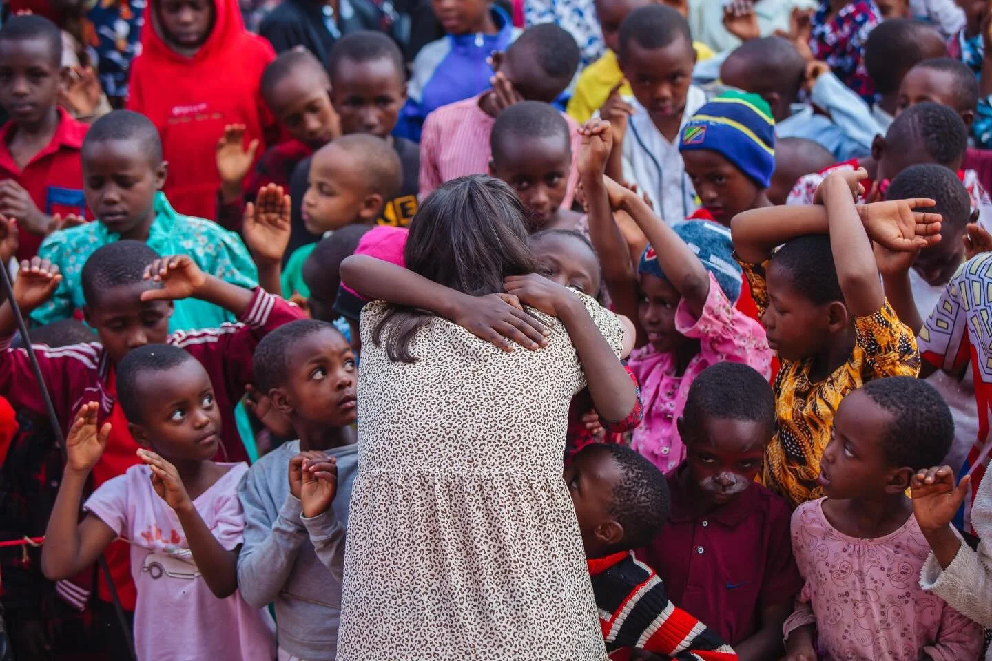 Third night of the festival in Tanzania.
Lauren felt it on her heart to offer hugs to any child who wanted one, and our team spent the night doing just that. Some of these kids had never experienced love like this before. It was quiet, powerful, and 