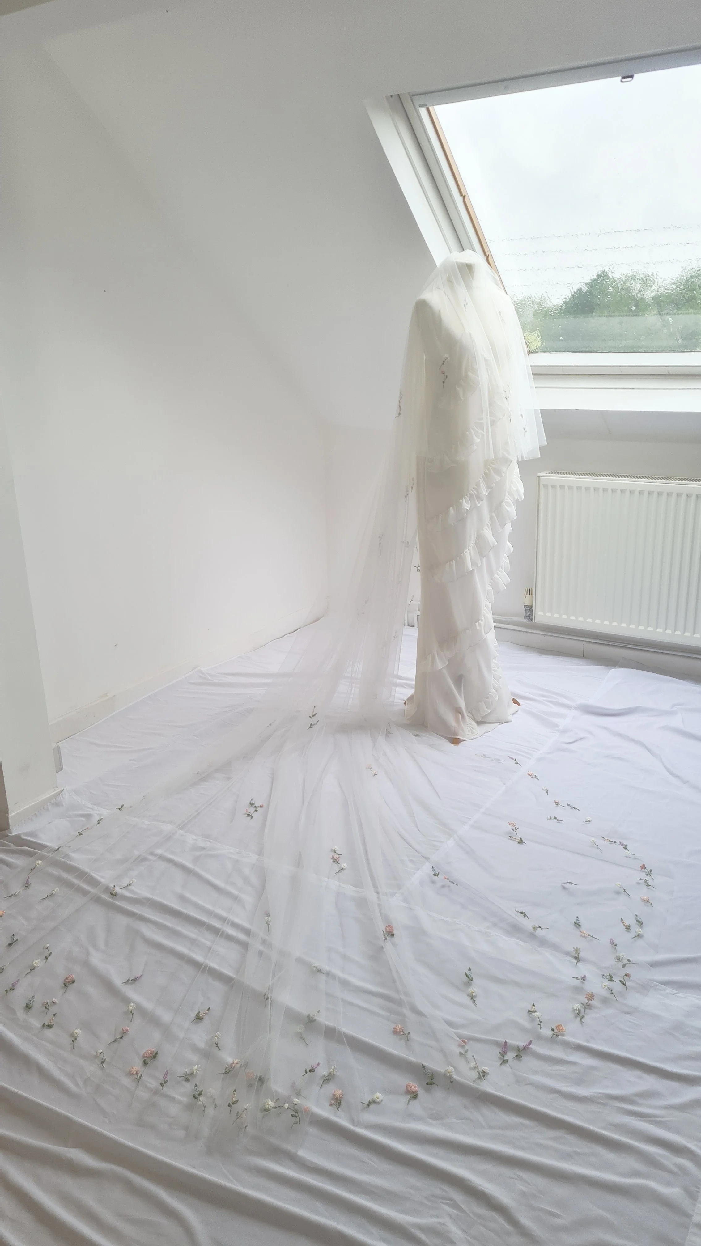 cathedral ivory veil with pastel hand embroidered flower border
