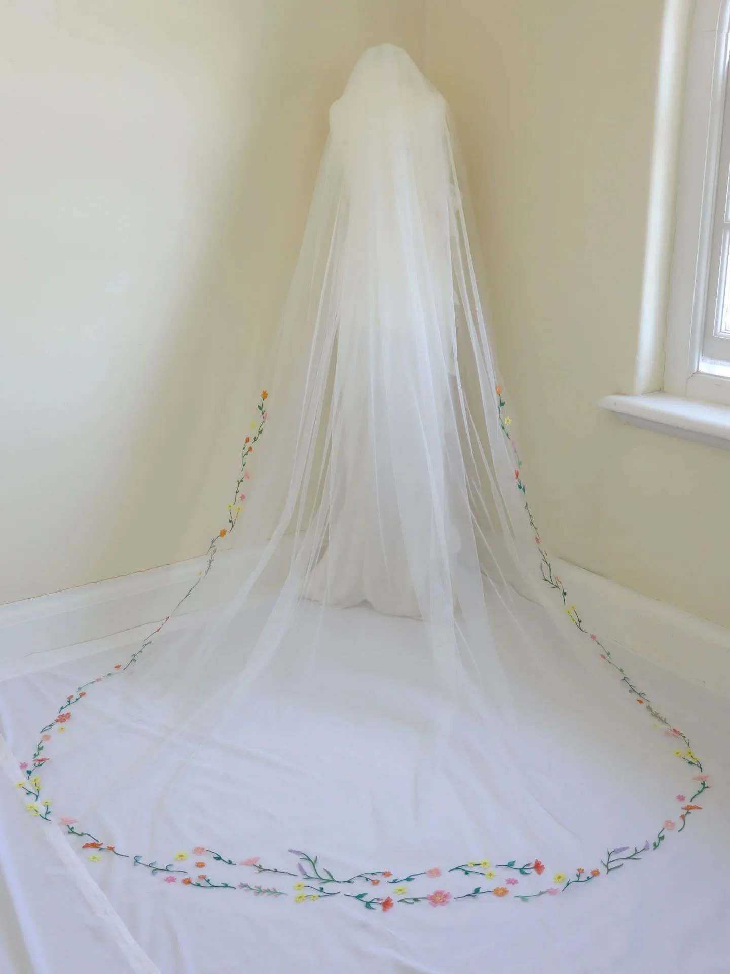 A veil for Tovah 🌸

Made using bright, fresh colours of thread to create a beautiful border of custom florals.

To make this wedding veil I took the brides vision of creating a border of thin stems and flowers in vibrant colours to complement her ce