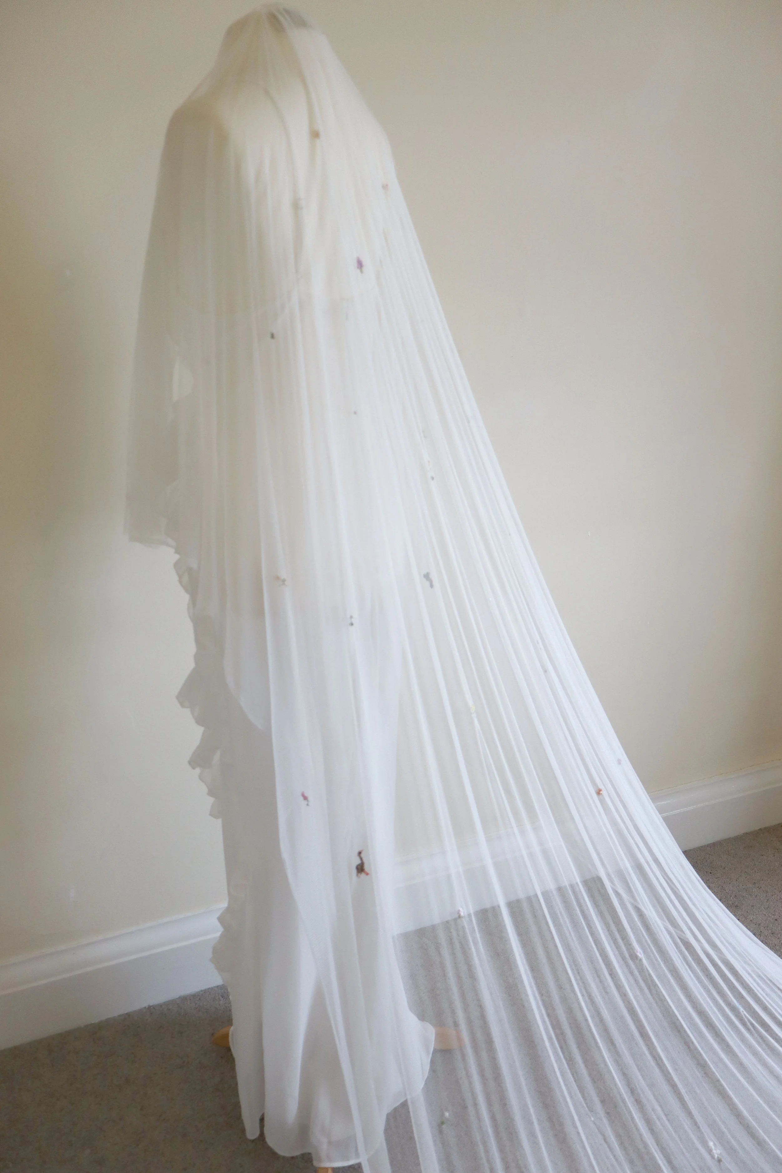 custom silk wedding veil with tiny flower embroidery