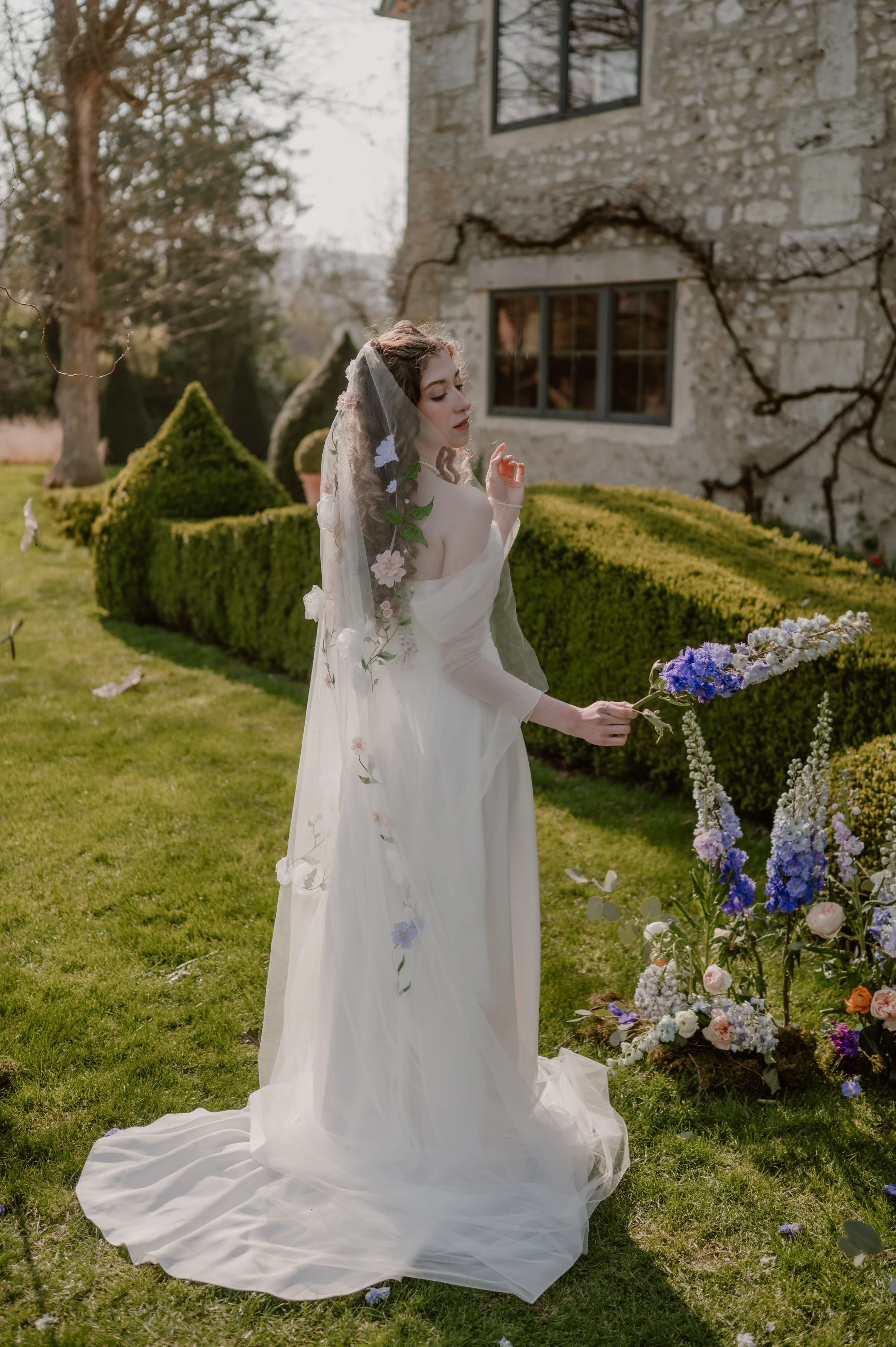 a destination french wedding with english garden meadow veil