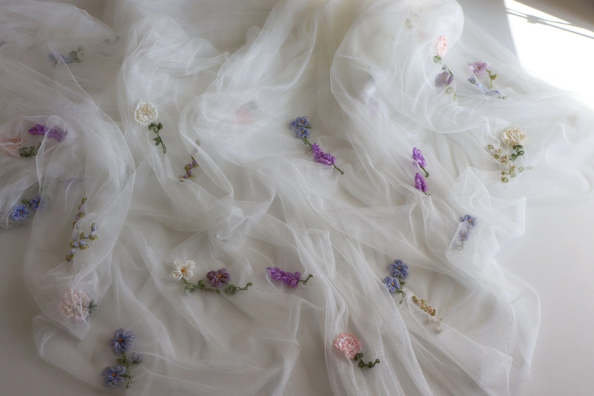 a luxury french silk cathedral wedding veil with hand embroidery flowers