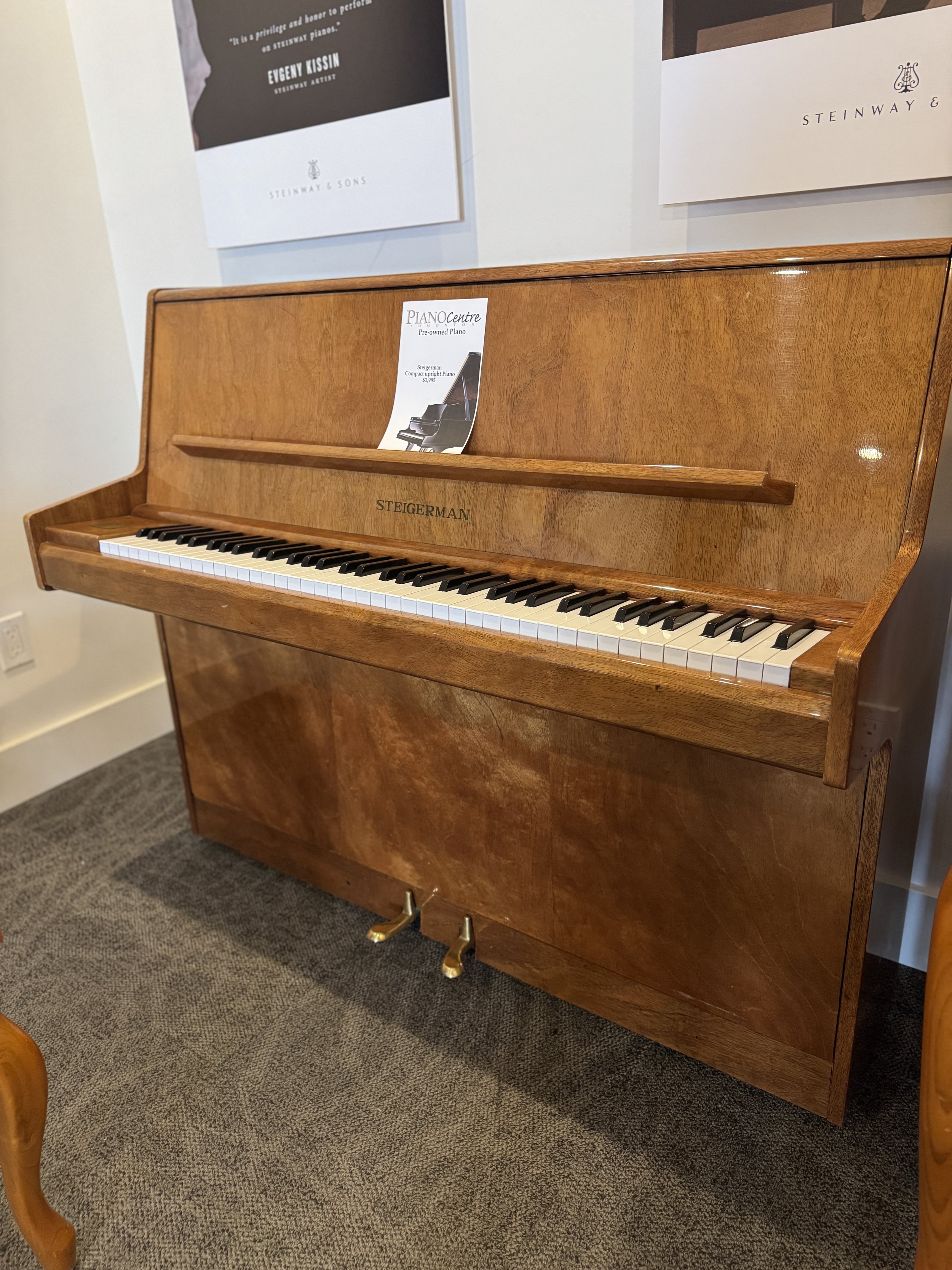 Beautiful Burl finish Steigermann upright for only $1500. An impressive sound for this beginner upright. Come see and hear it before it's gone!