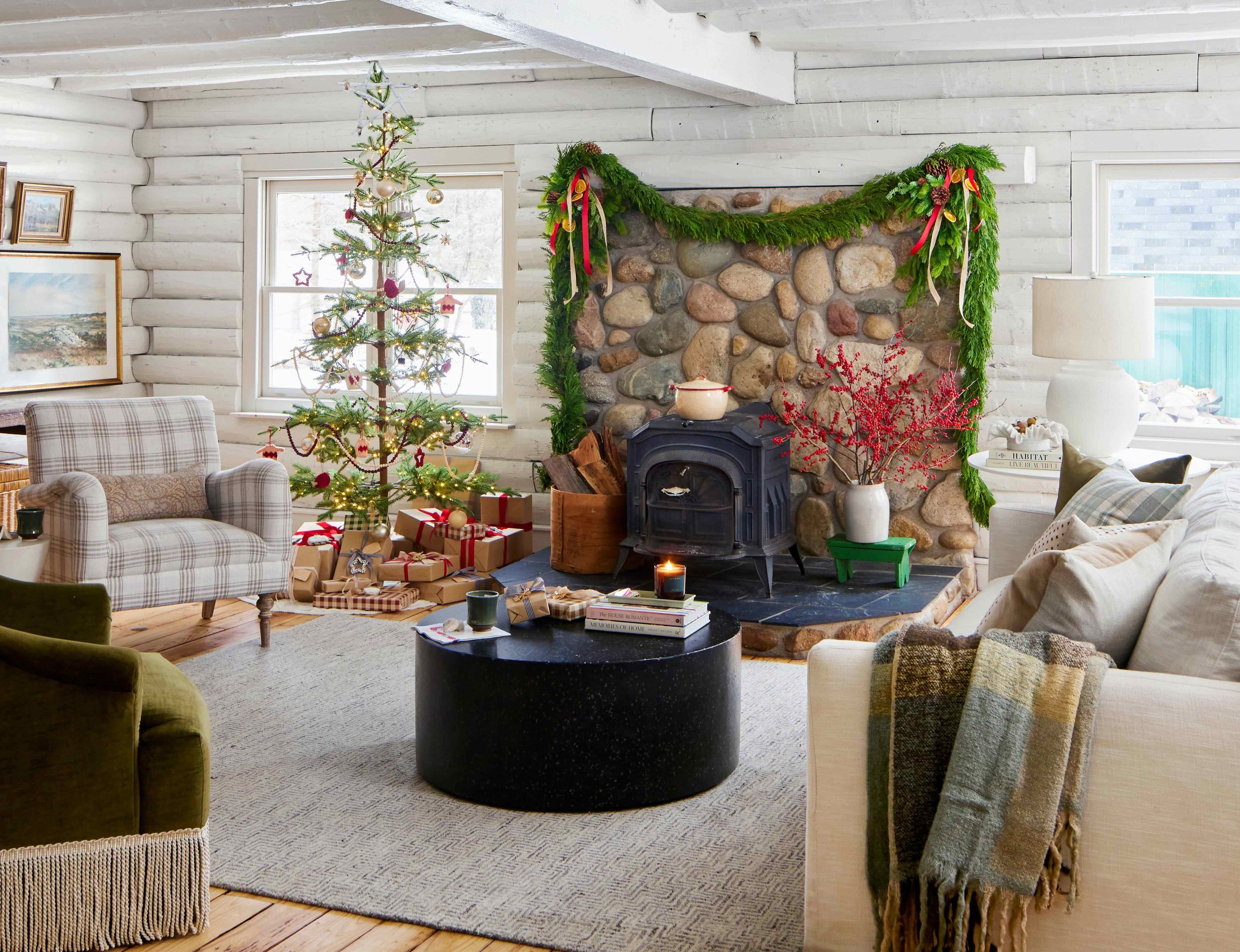Cozy Christmas cabin with stone fireplace