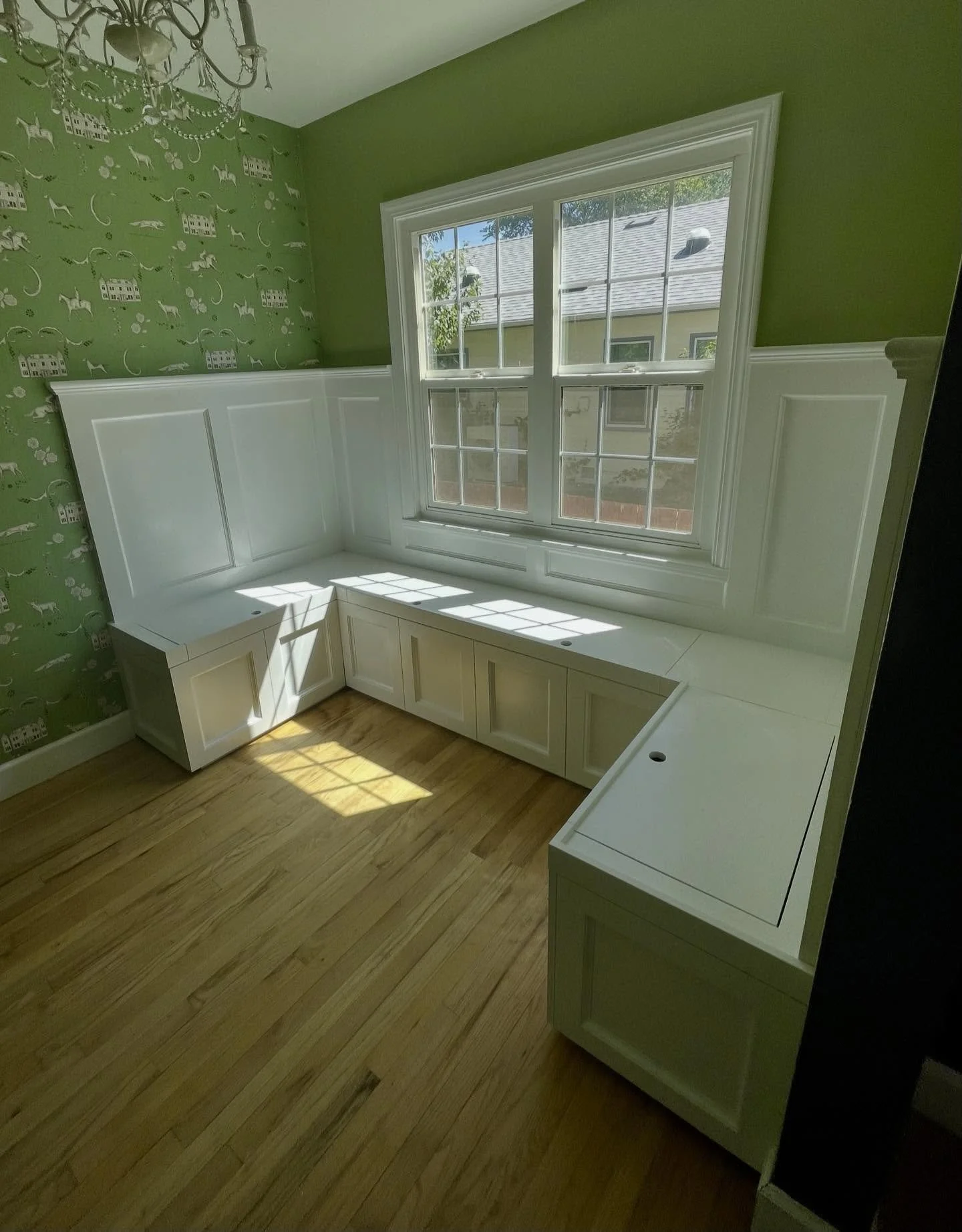 Custom built-in dining nook &mdash; storage, style, and ready for the table