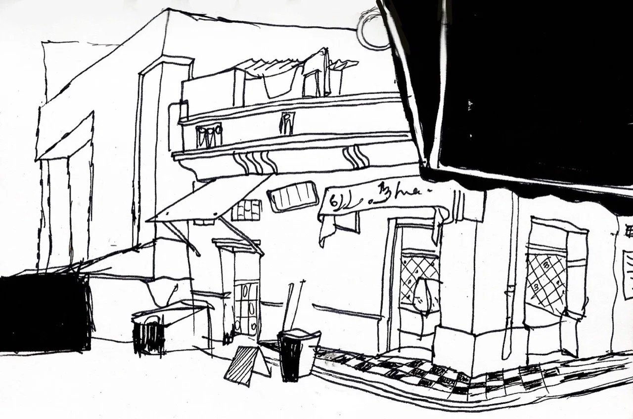 Black and white sketch of a street scene with a building that has windows and a sign with partially visible writing, along with a trash can and some objects outside.