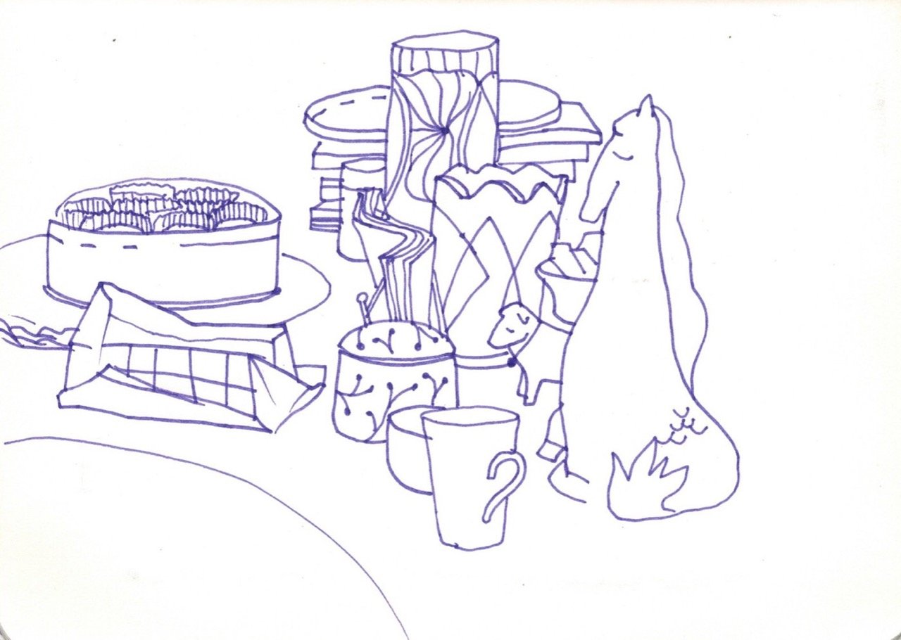 A line drawing of various candies and sweets on a table, including a cake, chocolates and a horse-shaped statuette.