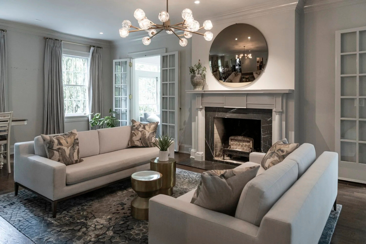 Elegant gray living room designed by Violet Marsh Interiors featuring layered furnishings, updated styling, and a warm modern aesthetic achieved without a full renovation