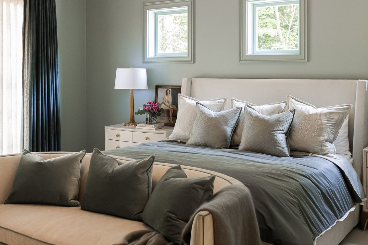 Elegant bedroom refresh featuring layered blue tones, refined furnishings, soft textiles, and warm modern styling by Violet Marsh Interiors