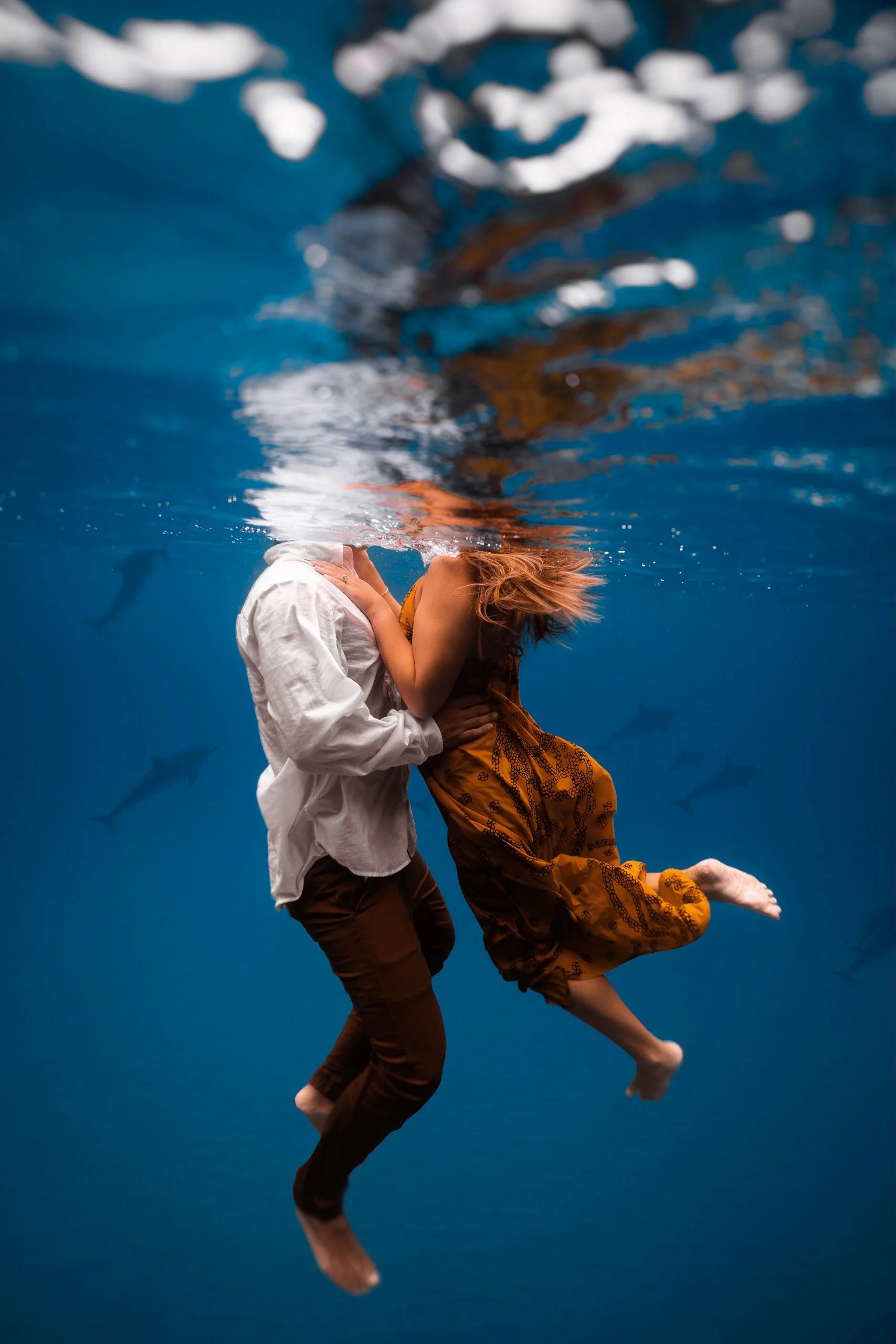 Couple embracing underwater