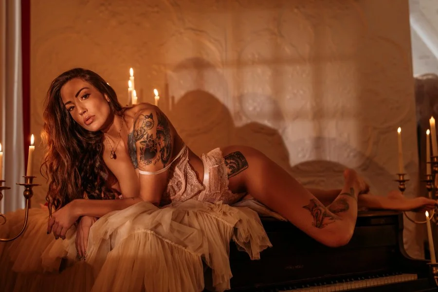 Piano room boudoir photography in Utah