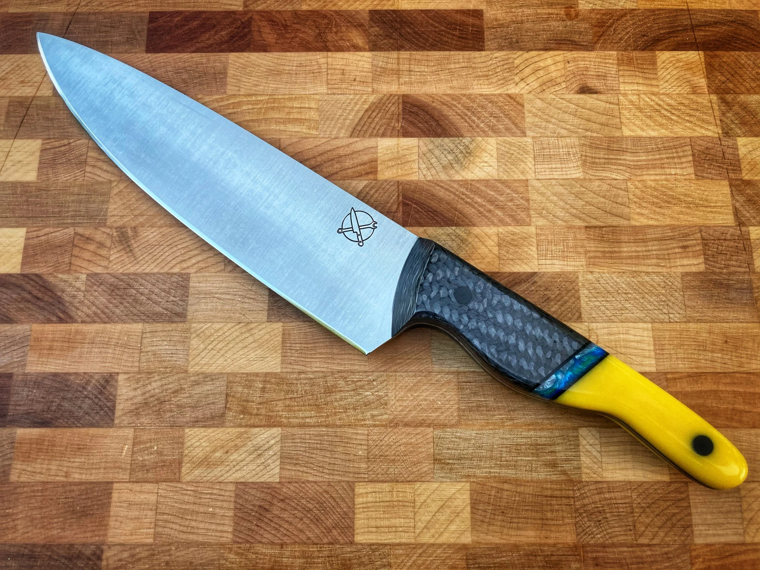 The Mule — 8" Chef's Knife in AEB-L | Segmented Carbon Fiber, Teal & Black Band & Bright Yellow Resin | Solid ¼" Carbon Fiber Pins — SOLD | A custom commission built to carry the DNA of a client's dream car — a yellow RX7 finished in carbon fiber and