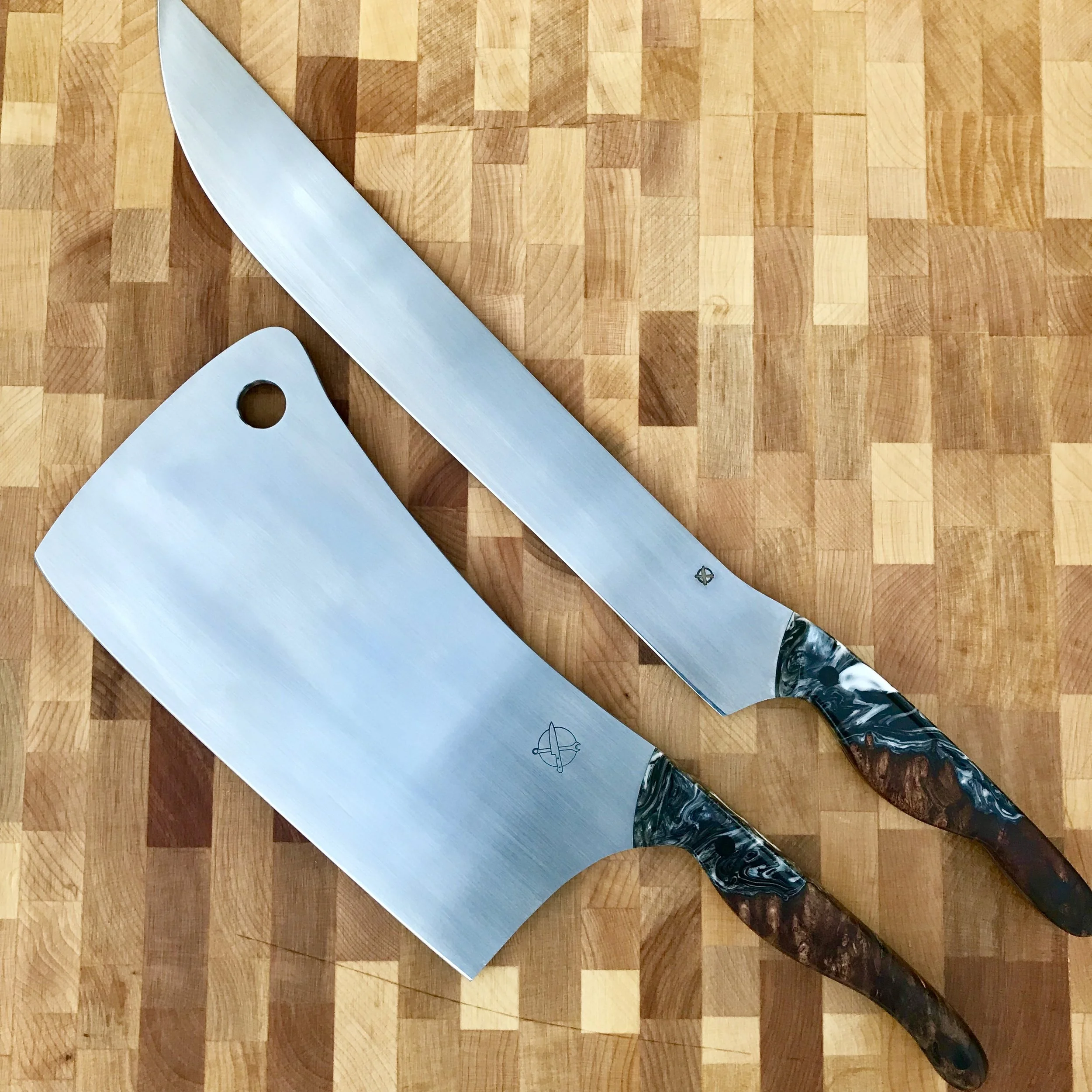 The Lumber Jack & BBQ Slicer — Matched 2pc Set in AEB-L | Maple Burl with White, Black & Silver Resin | Solid ¼" Carbon Fiber Pins — SOLD | A matched set built around a football team that packed up and moved from California to Nevada — and a fan who 