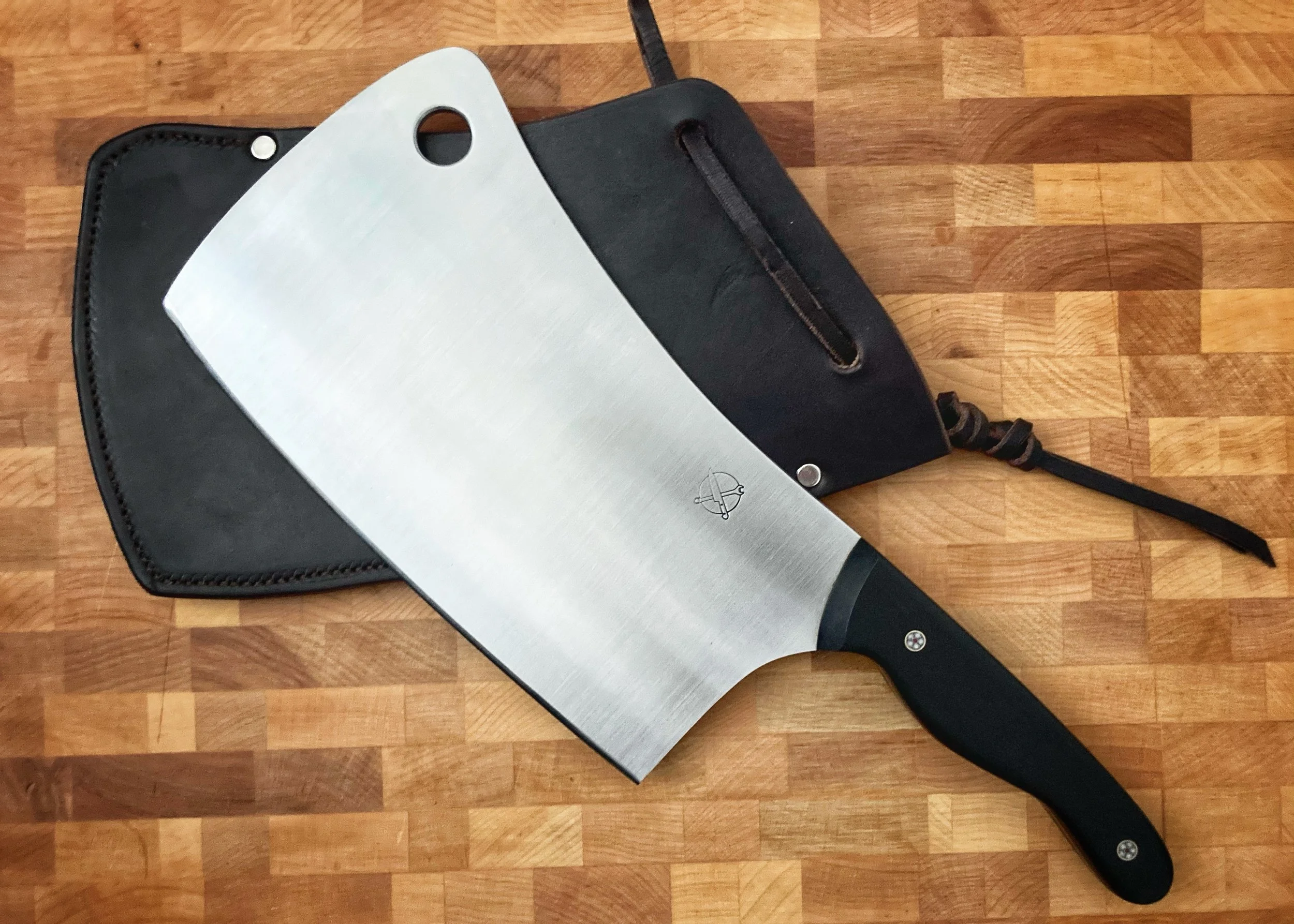 The Lumber Jack — Full Size Meat Cleaver in AEB-L | African Blackwood | ¼" Mosaic Pins | Custom Leather Sheath — SOLD | African blackwood — one of the densest and most tonally rich natural handle materials available. Paired with mosaic pins and finis