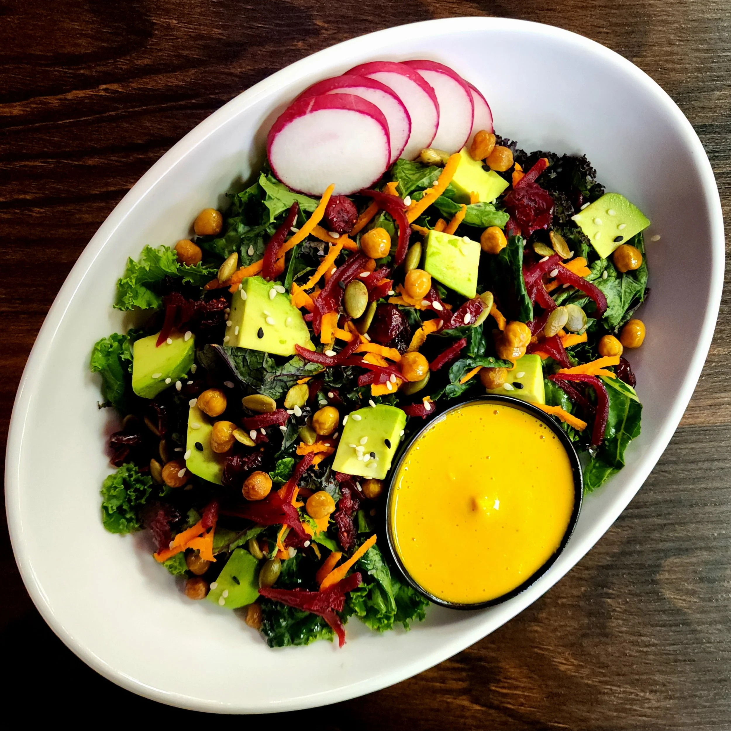 Kale Yeah Salad with a Carrot Ginger Dressing.