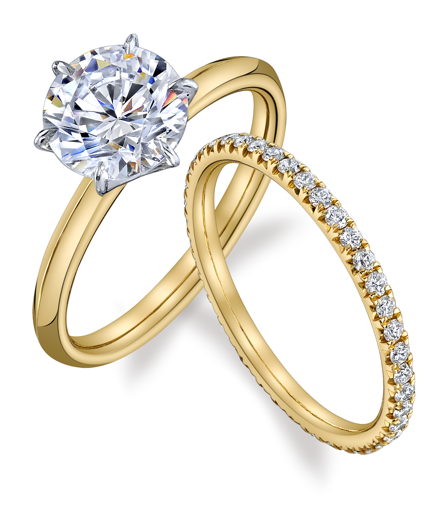 Gold wedding ring set with a diamond engagement ring and matching diamond band