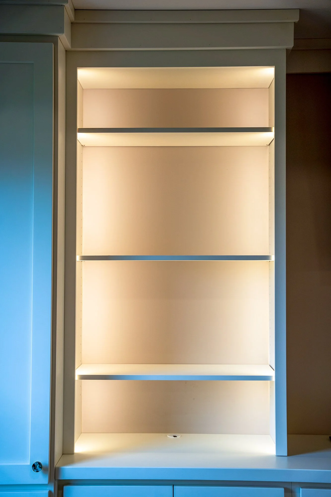 Complete First Floor Remodel by KBC Inc. 
Detail shot of lighted shelving.
