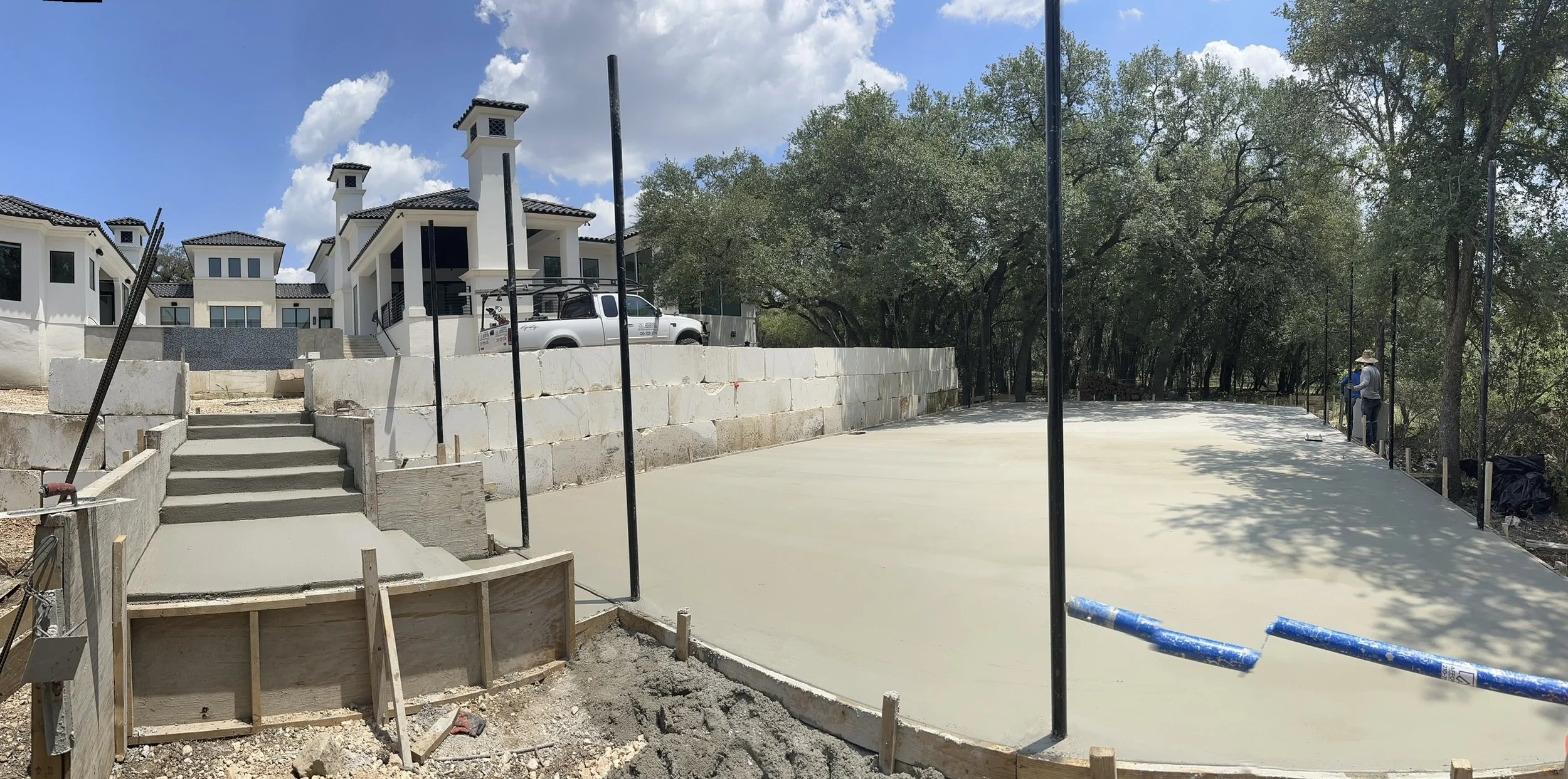 Pickleball court concrete slab under construction with forms and reinforced concrete in Boerne, TX