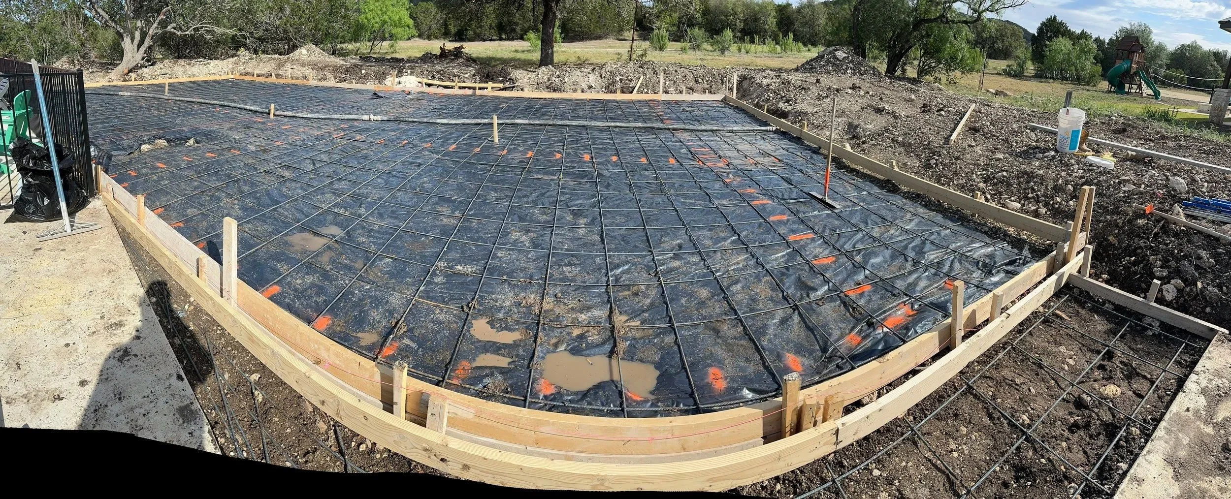 Concrete pickleball court foundation under construction in Boerne TX with #3 rebar reinforcement