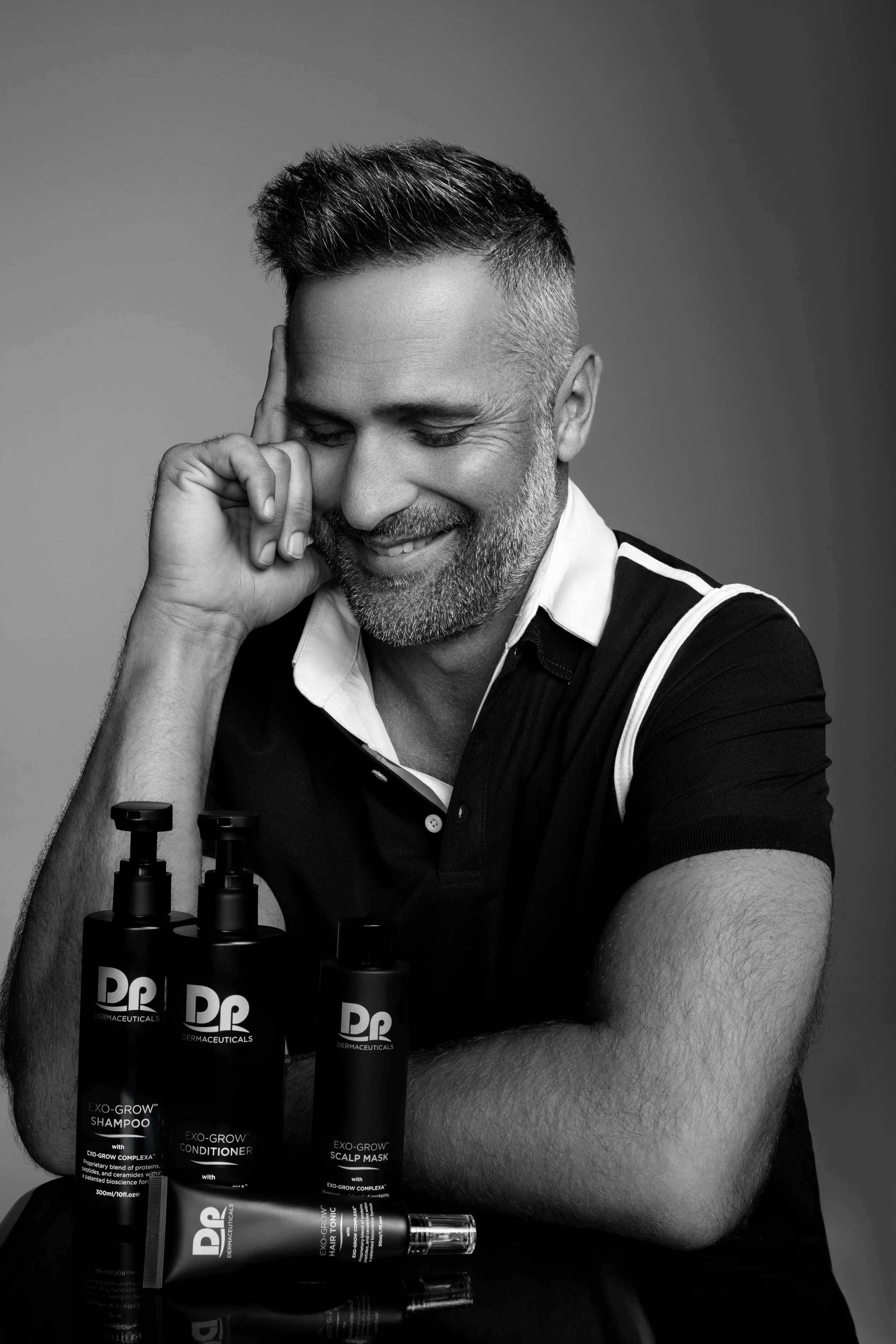 ExoGrow Male Model - our DP ExoGrow microneedling package for hair restoration and hair growth