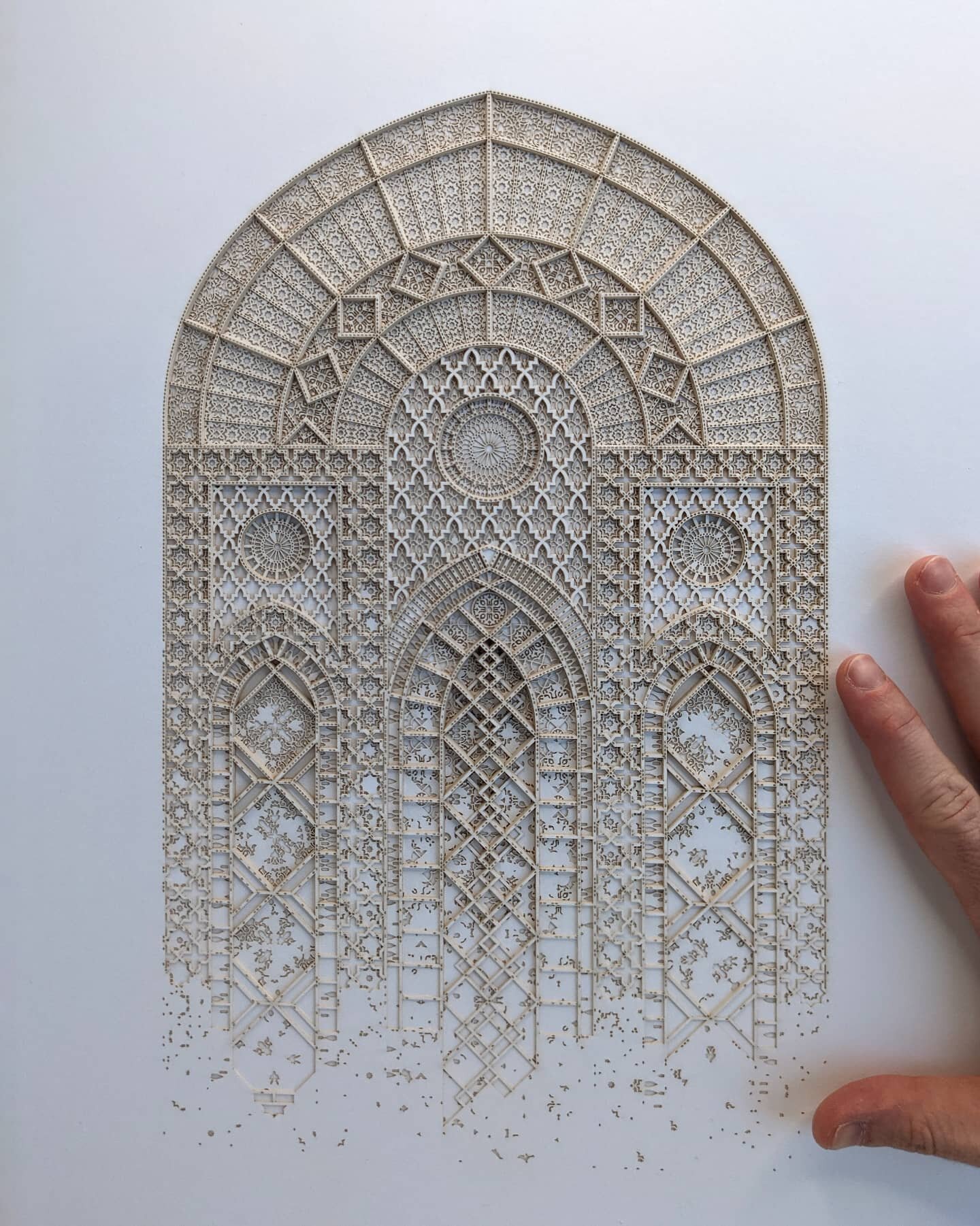 Fading through layers of paper.

Sands of Time No.4 - 29cm x 43cm - layered cut papers - (photographed with hand for scale). For inquiries about this series, please email hello@ibbini.com.&nbsp;

#detailphoto #algorithm #door #handmade #lasercut #ado