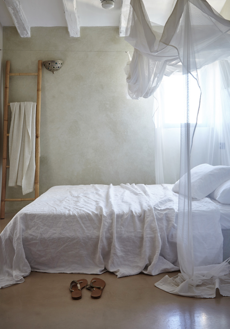 Bed with white linen