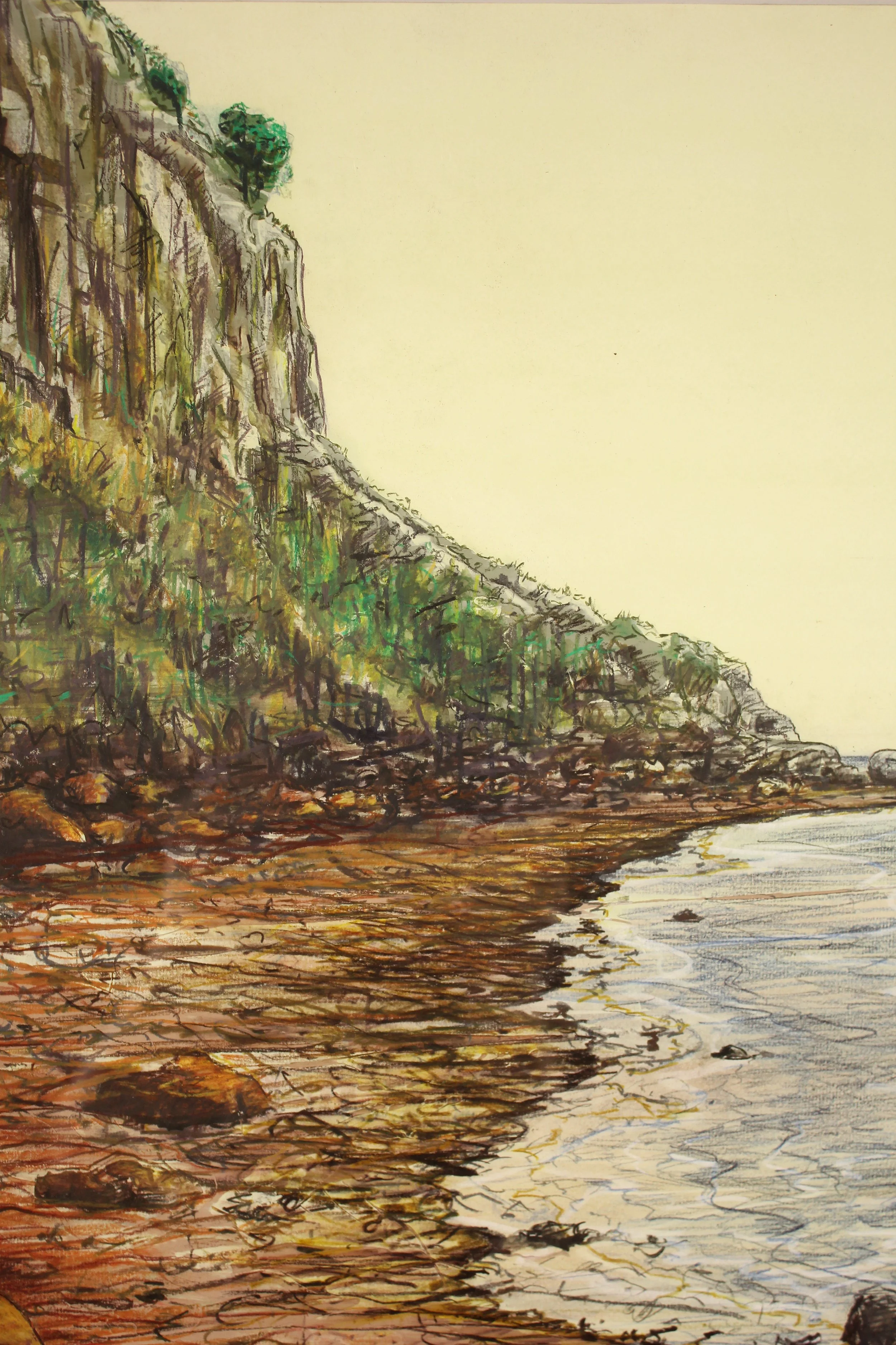 A detailed landscape drawing from the rocky shoreline at Bonchurch on the Isle of Wight where the rusty red iron in the earth and rocks seeps into the sea staining the beach orange in veined rivulets. This coastal seascape captures the large boulders