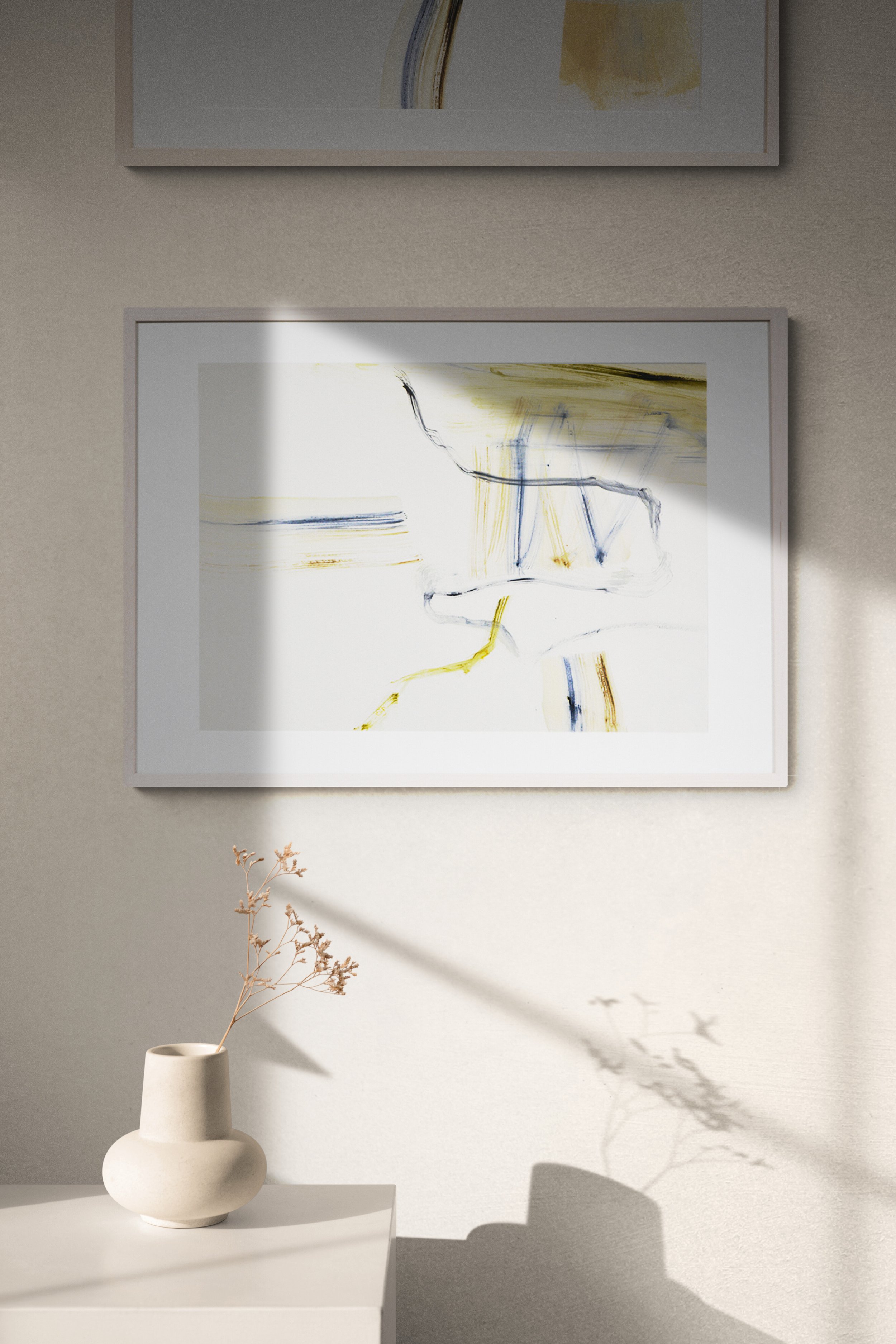 Vase_with_dried_grass_in_sunlit_room.jpg