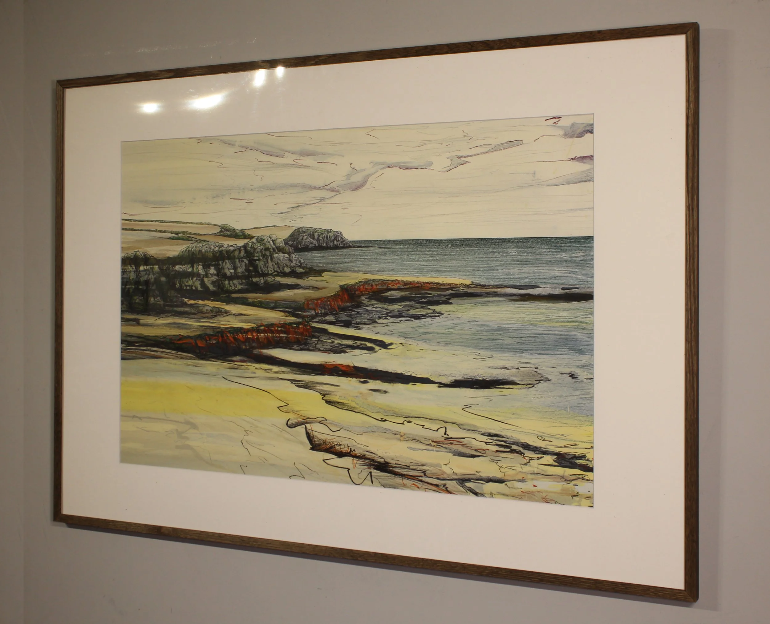 An abstracted drawing of the view eastwards from Prawle Point in Devon.  Chalky Farrow & Ball paint and ink has been dragged across the surface. Into this, expressive drawing of rocks and headlands has been overlaid with watercolour pencil.