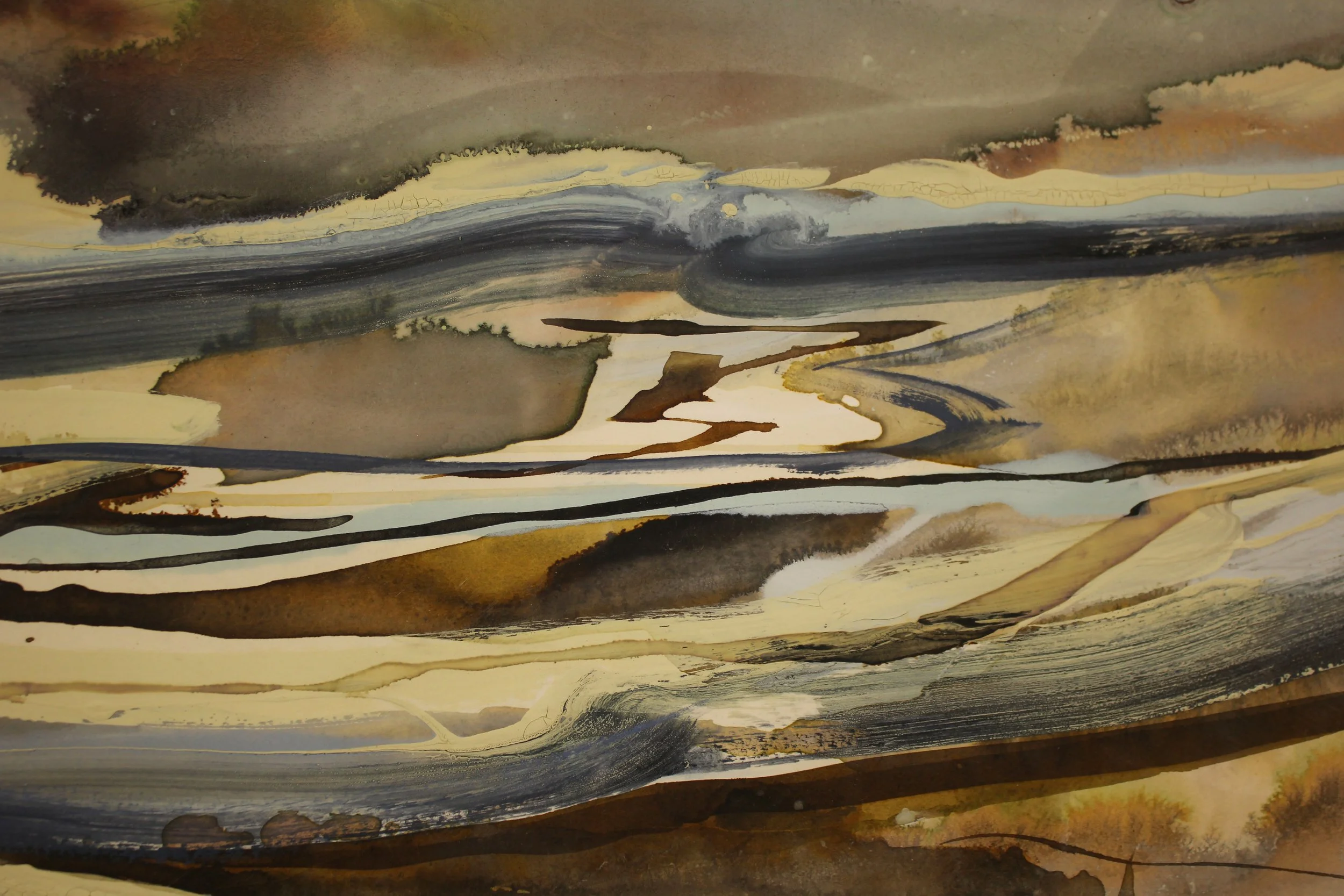 An abstracted ink painting that suggests waves depositing into to the beach. Paint and ink has been poured, seeped and dripped onto the surface in a calligraphic style with earth tones, frothy lemon whites and deeper slate grey tones.