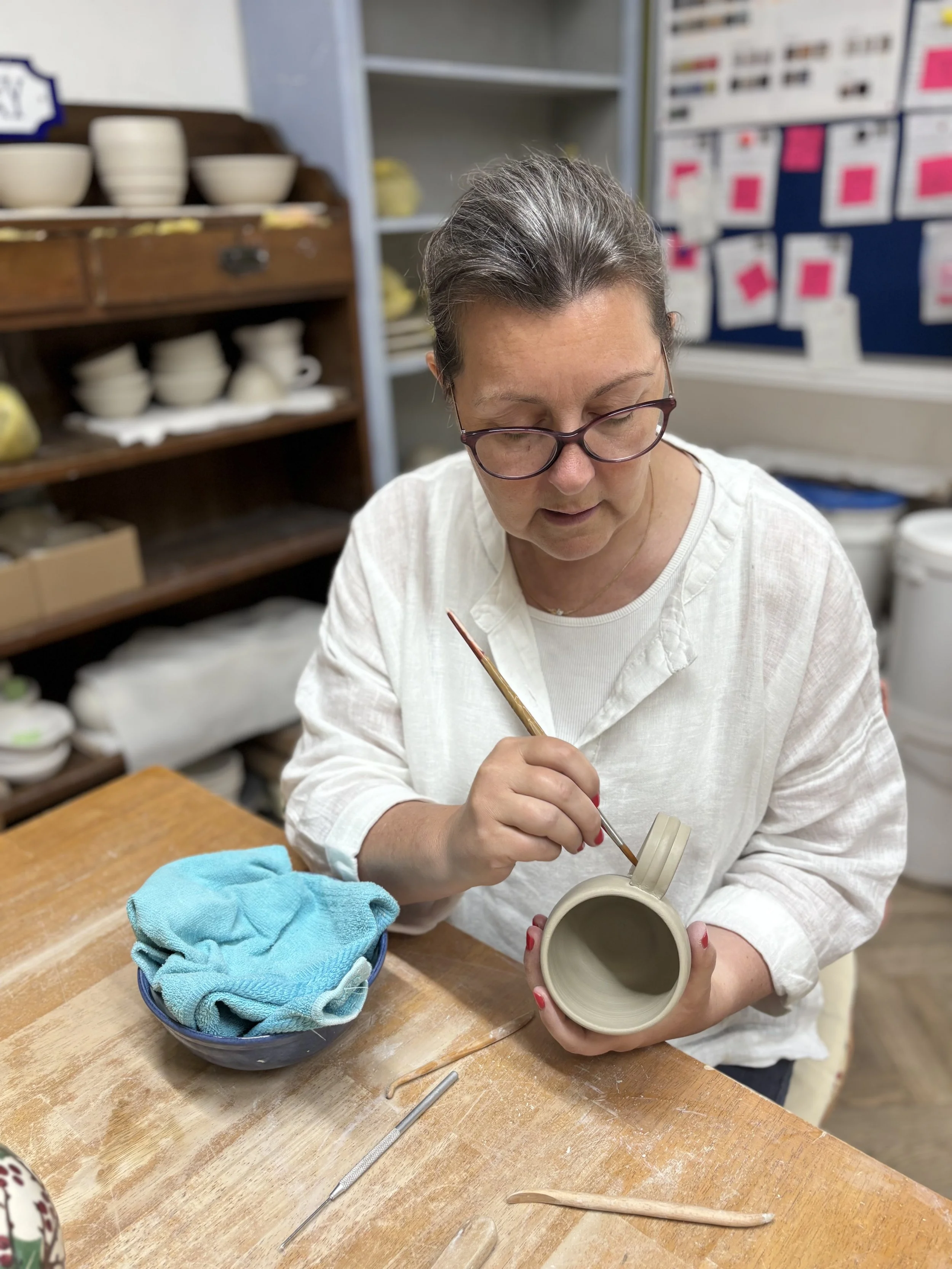 Vicky has been trimming her pieces & adding a handle to her mug!