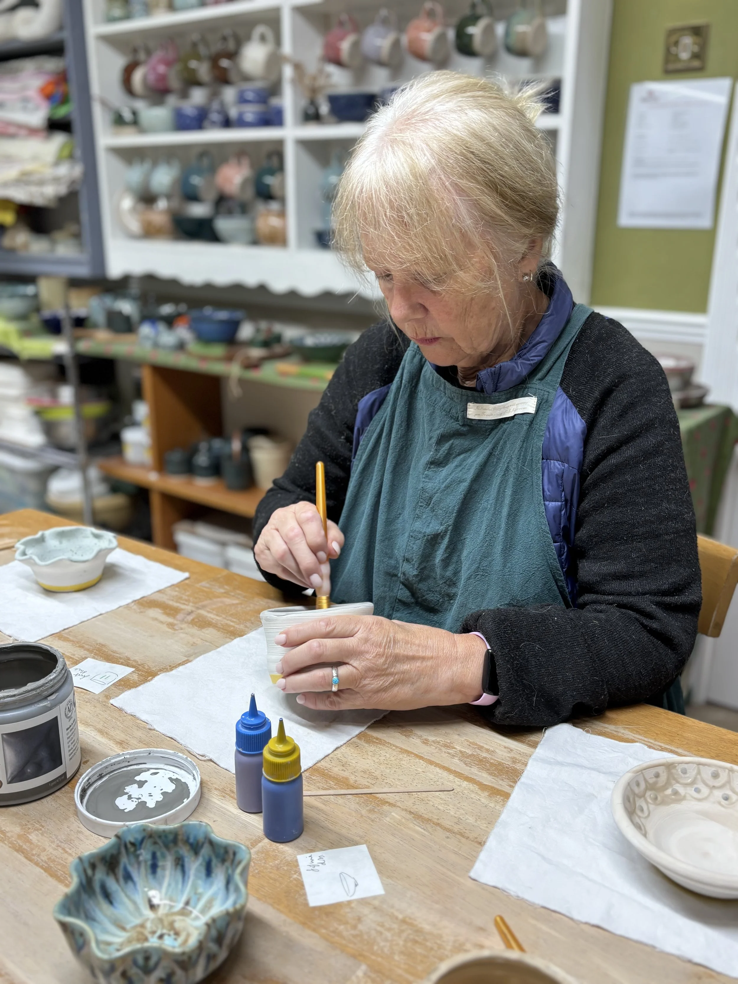   
 ... & Mum Bryony who returned to finish off their pieces with their choice of glazing!   
 