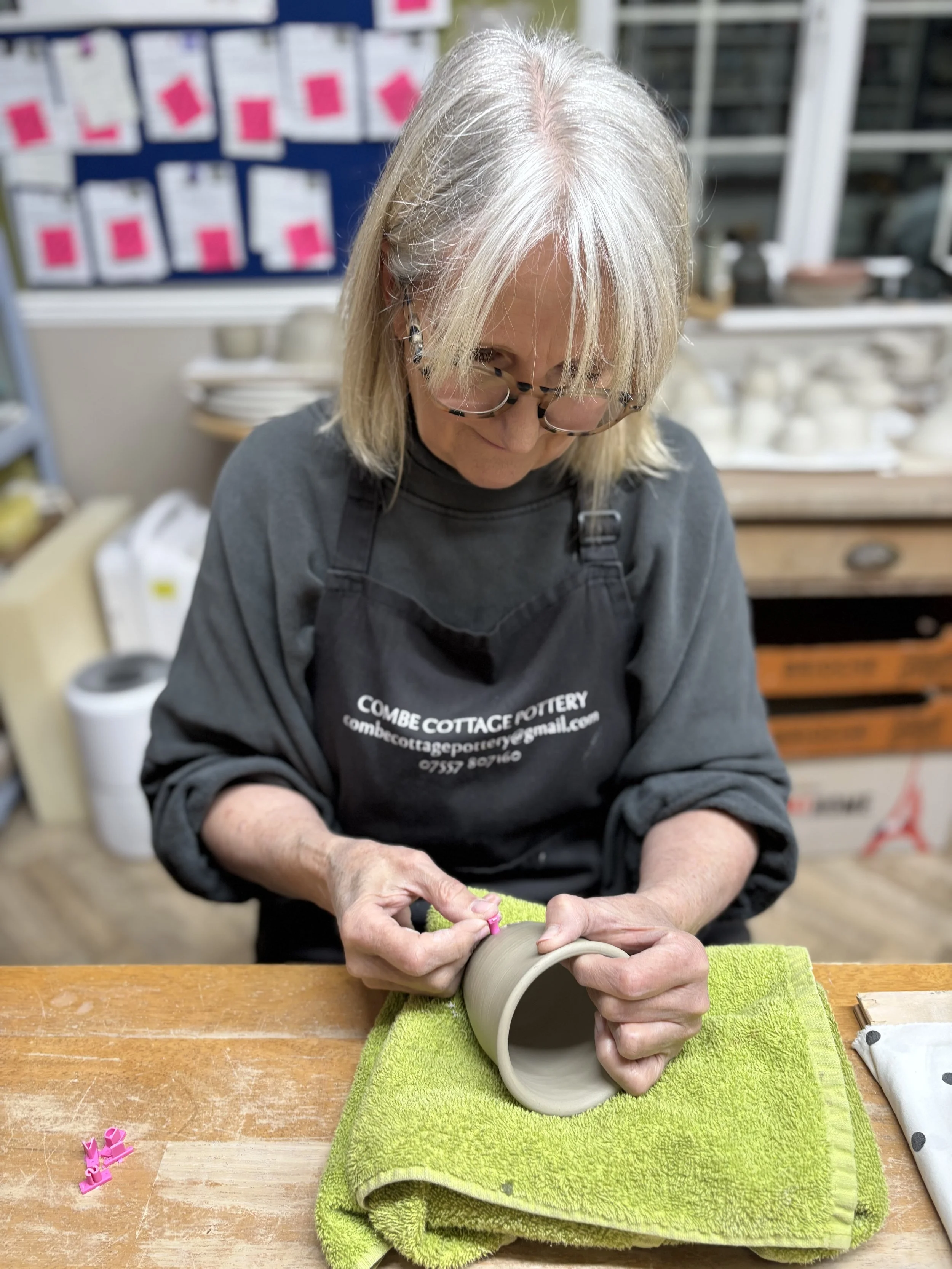   
 ... adding finishing touches & choosing their glazes for their final session!  
 