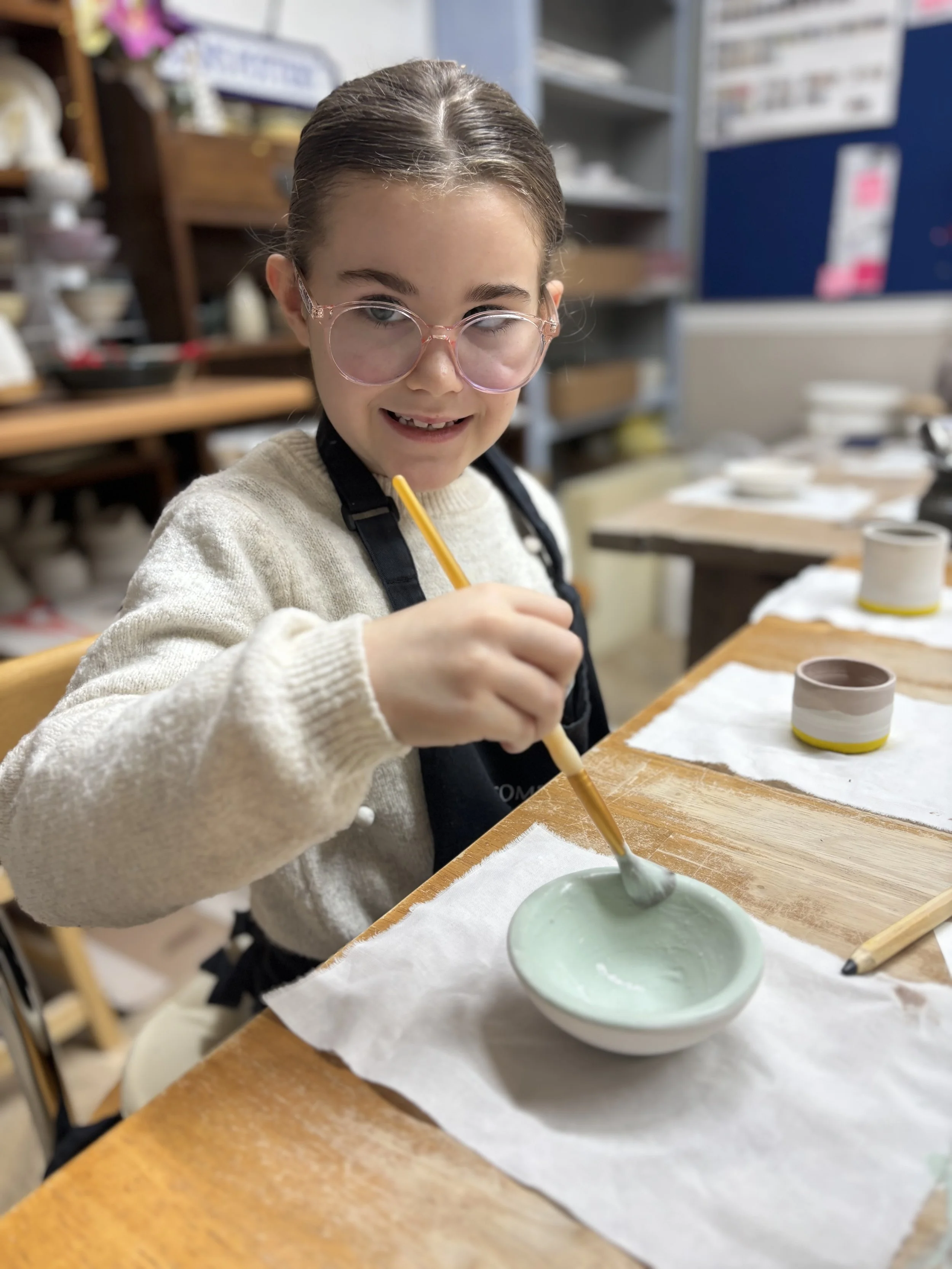   
 ... & the delightful Macie to glaze their pieces following their 'Throwing Experience'  
 