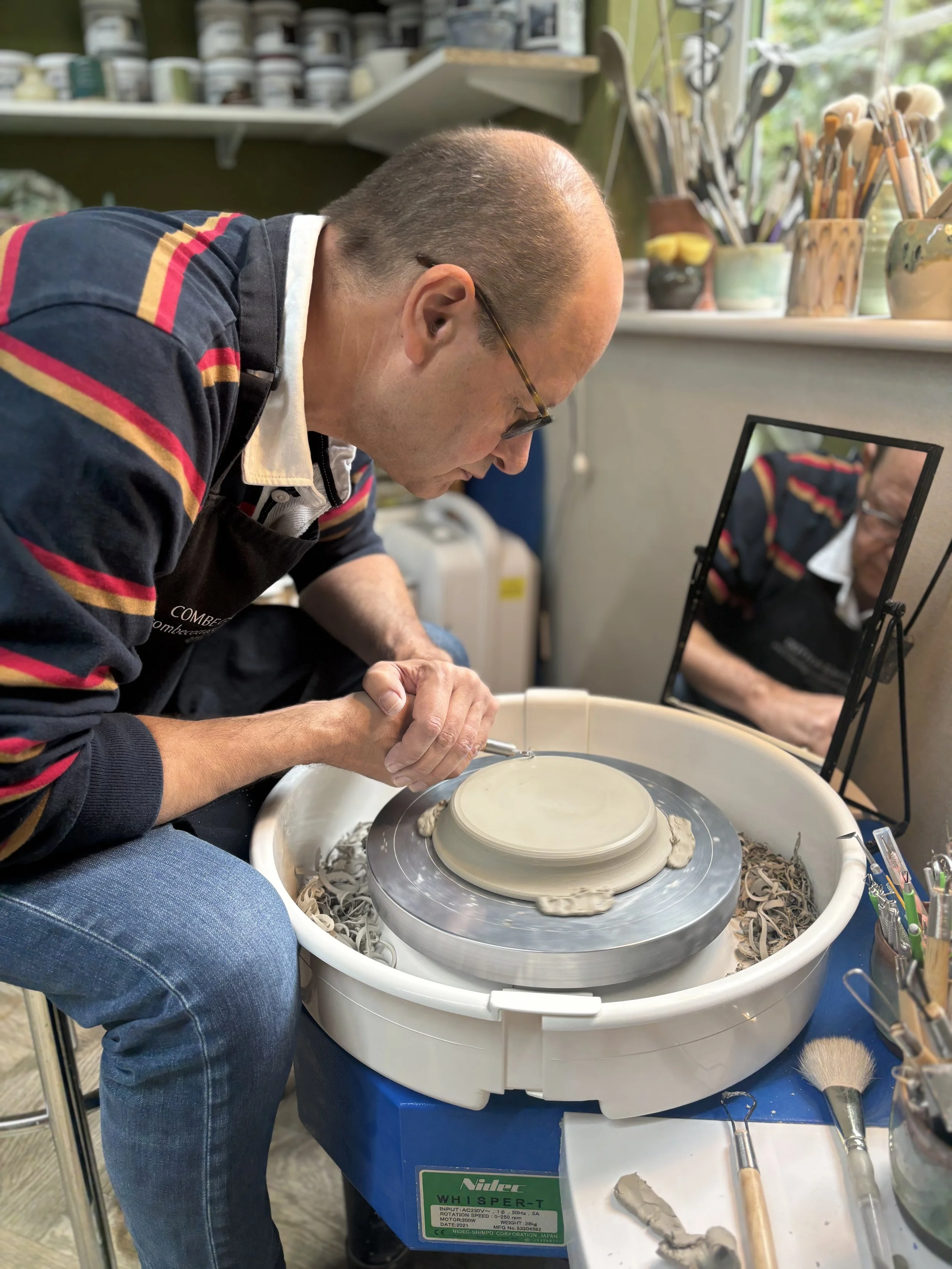   
 Steve has been trimming and decorating his first plates! 
 