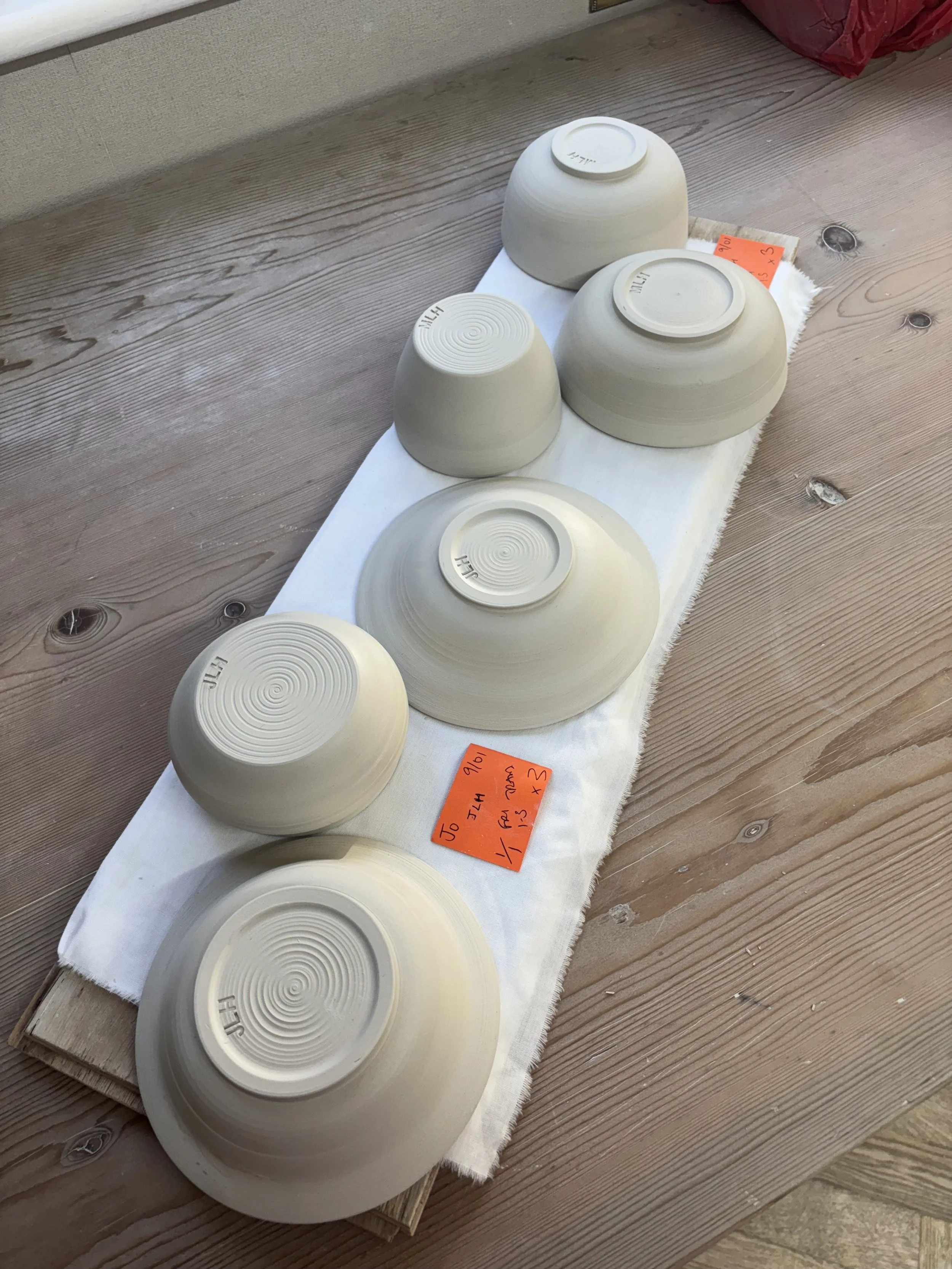   
 Jo & Mark's pieces have been trimmed following their 'throwing experience' and will be bisque-fired before they return to glaze them!  
 