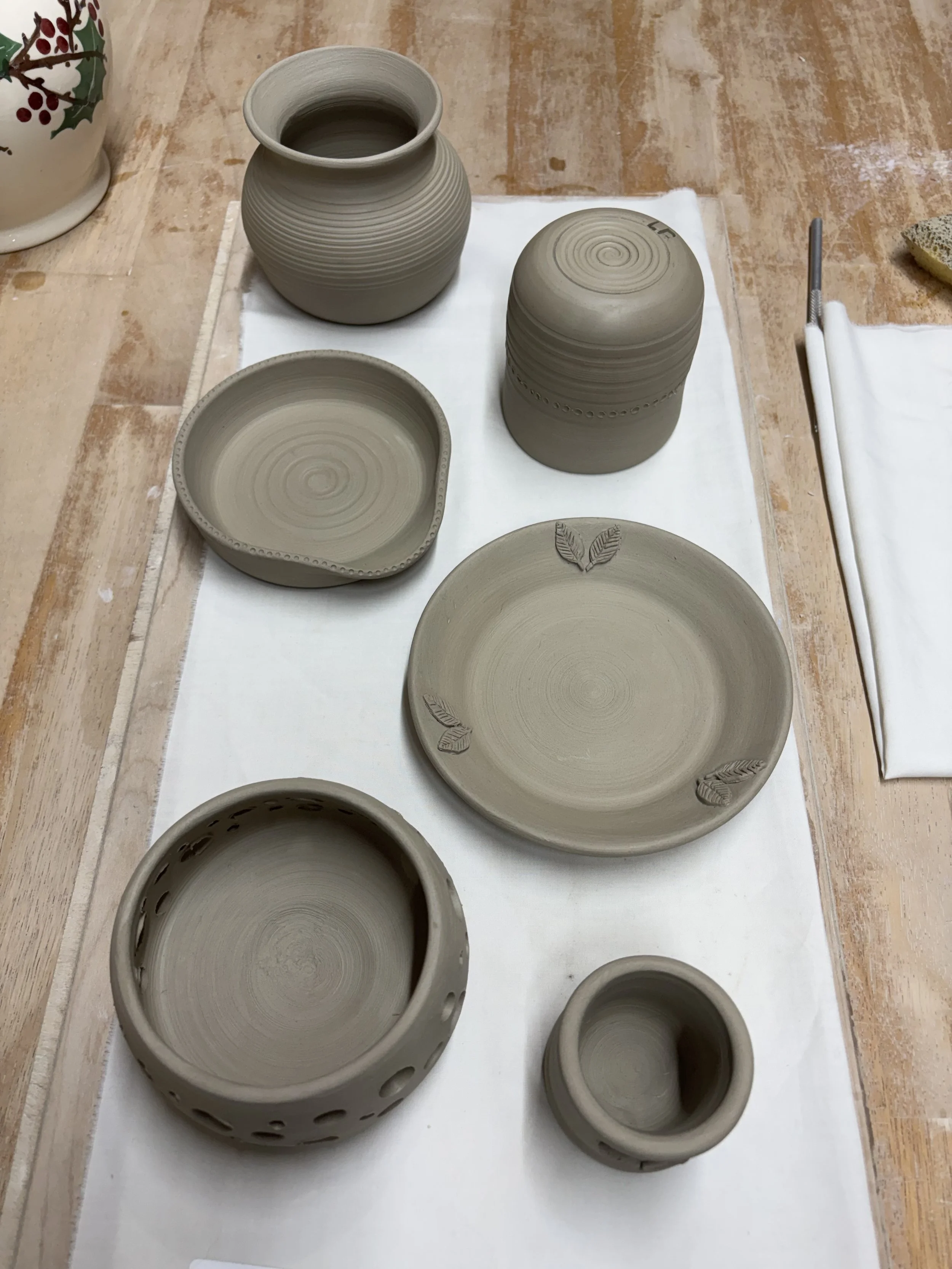   
 their latest pieces drying out ready for their bisque fire! 
 