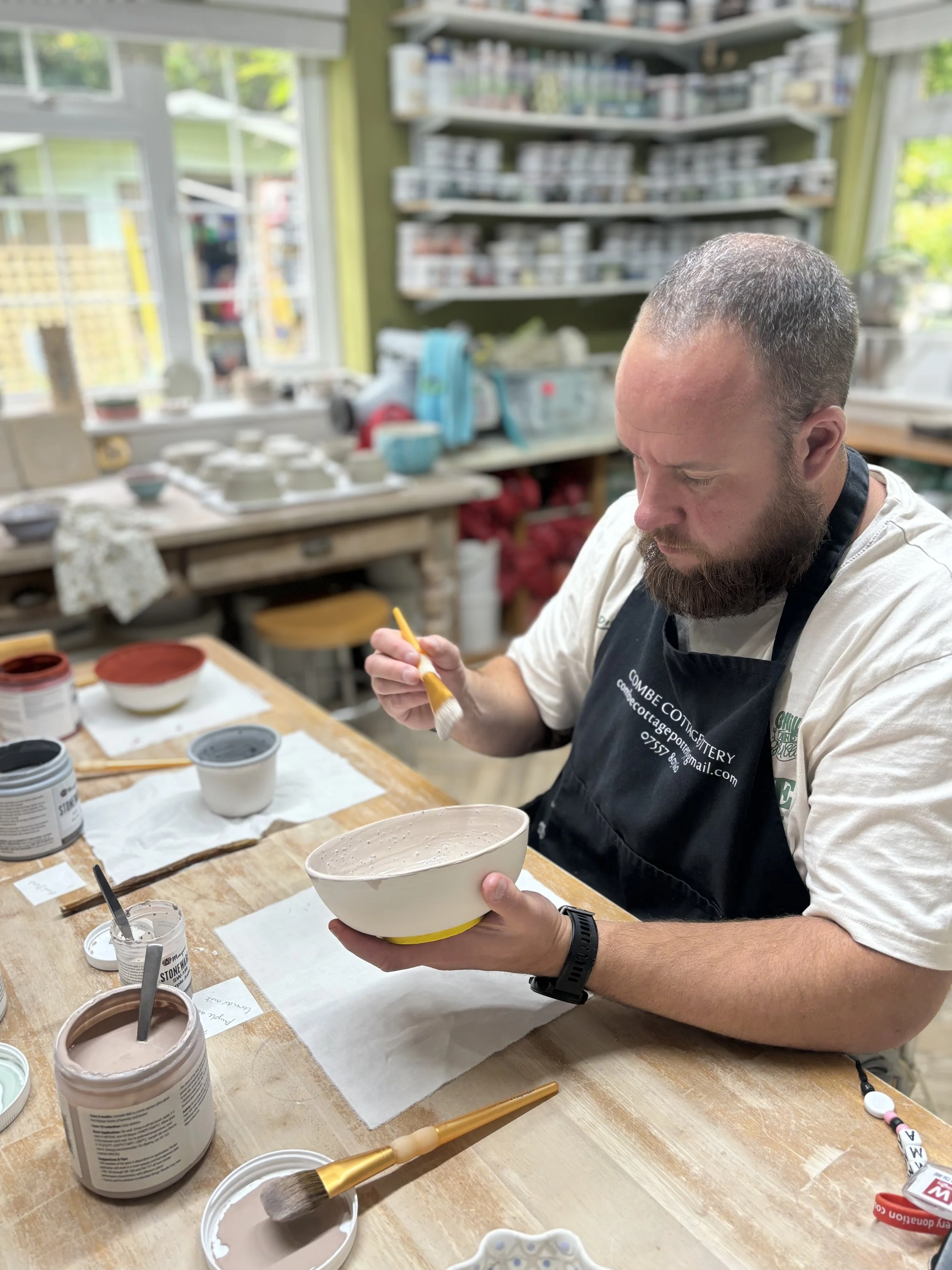 ... & Guy who returned to glaze their previously thrown pieces!