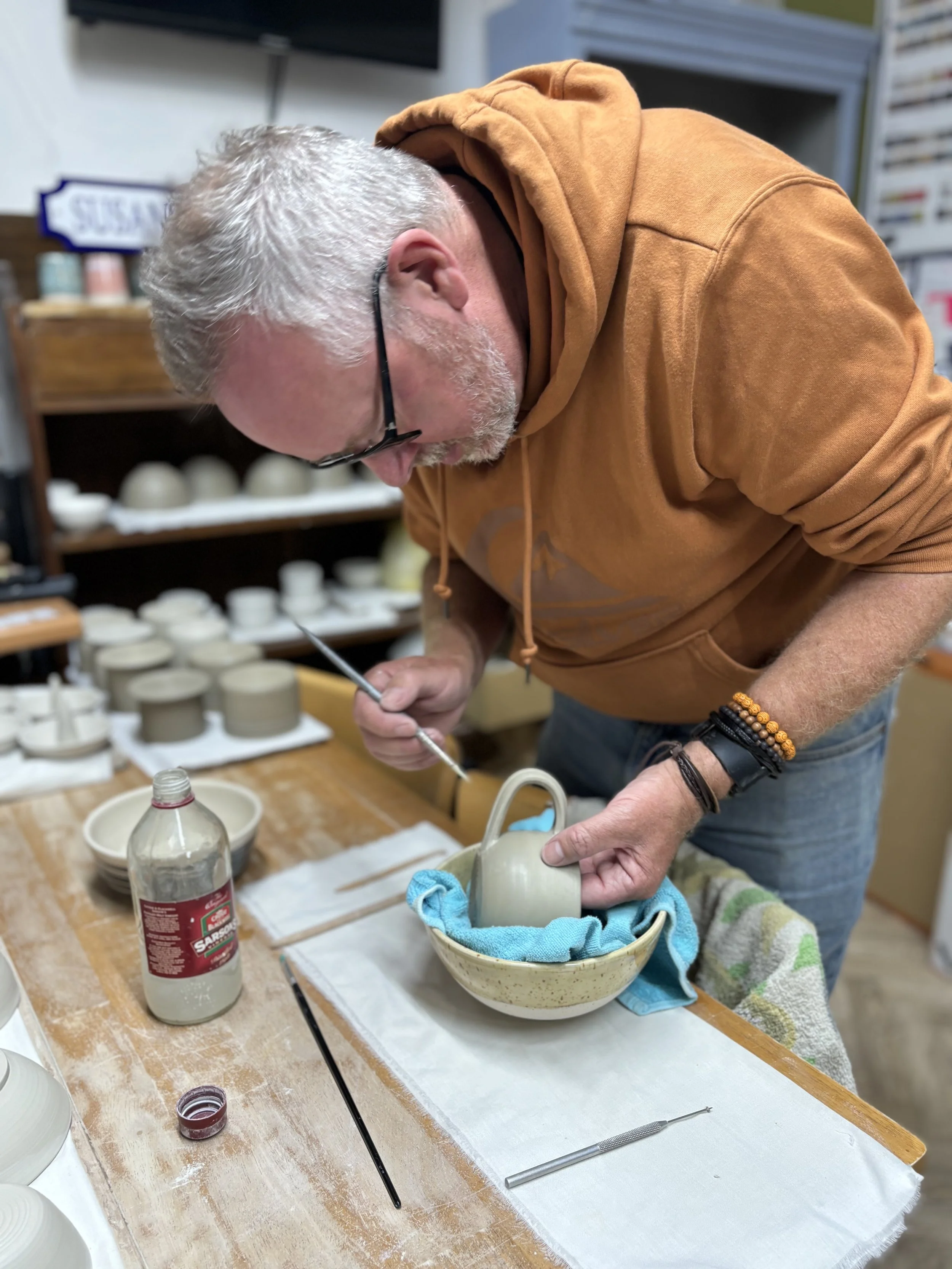 Tony has been trimming his first pieces and adding a handle to his mug!