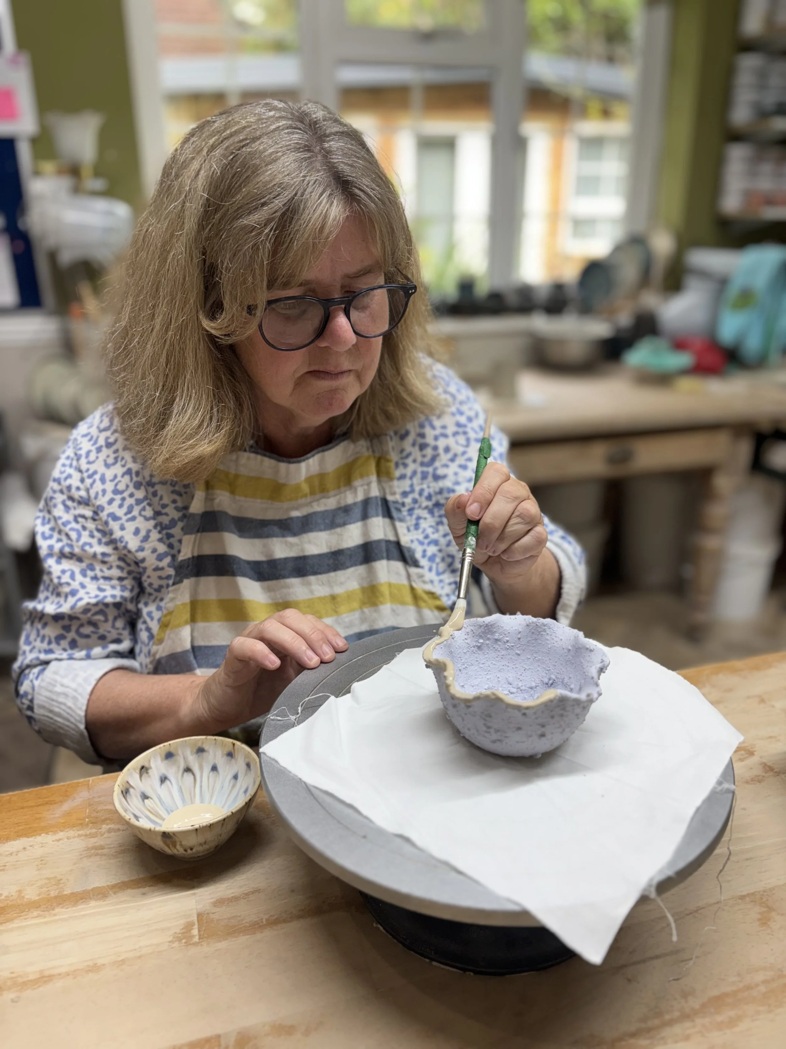   
 Sam has been glazing her pieces at the end of her 'throw, turn & glaze experience'! 
 